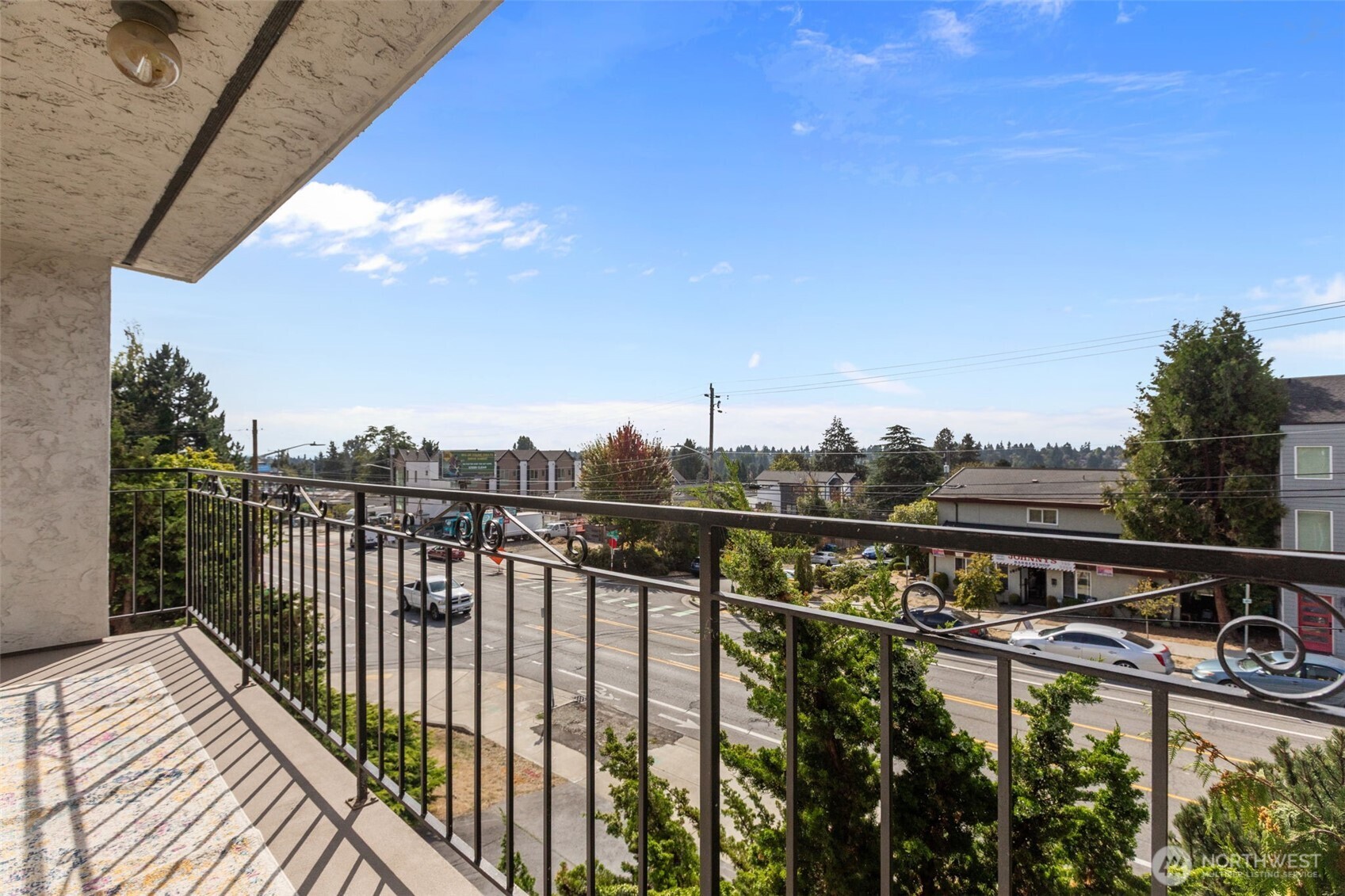 Sunset Villa community with secure entry and covered garage parking