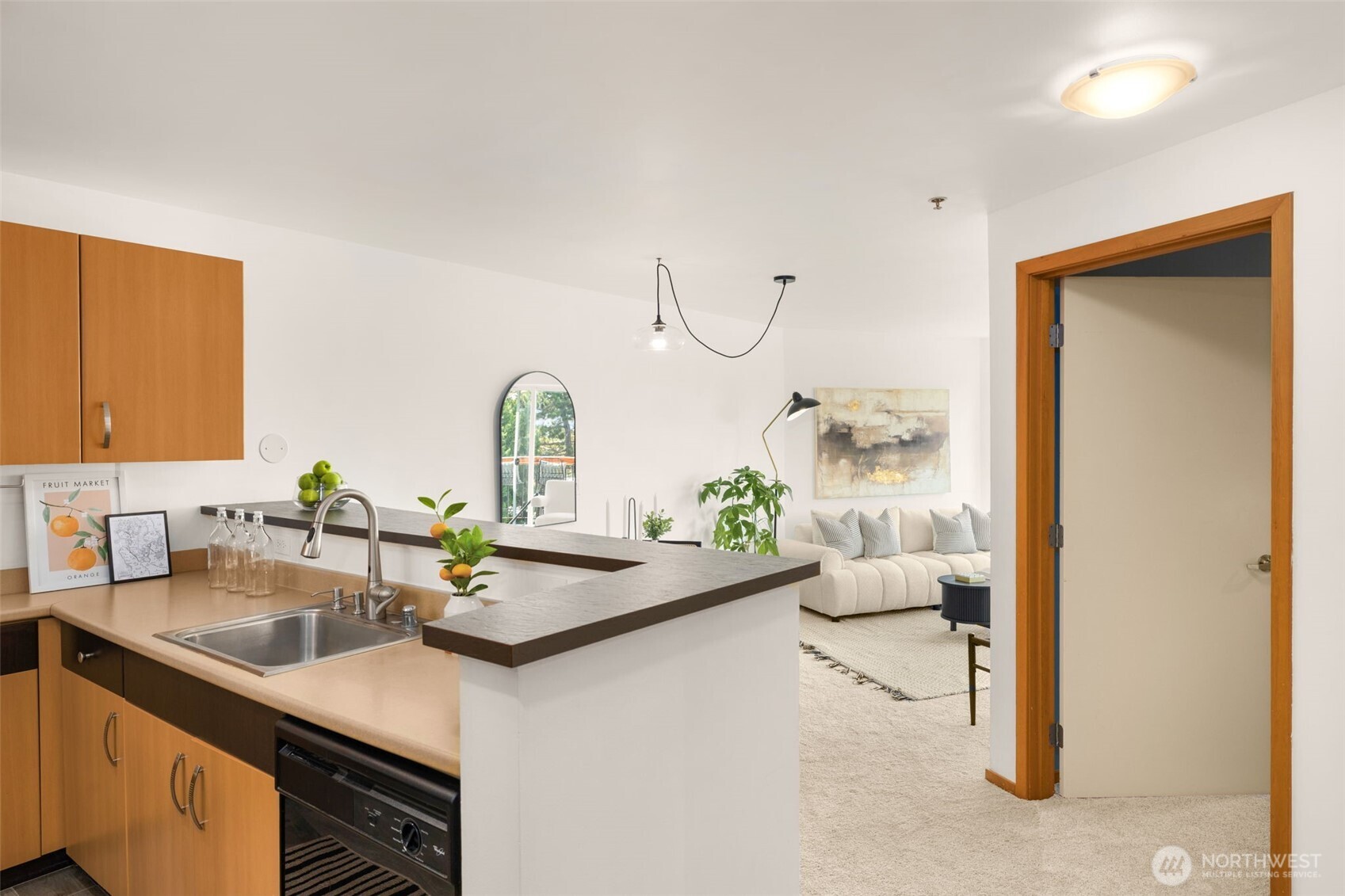 Stainless steel appliances, brand new microwave, and sleek finishes. Motion-activated faucet