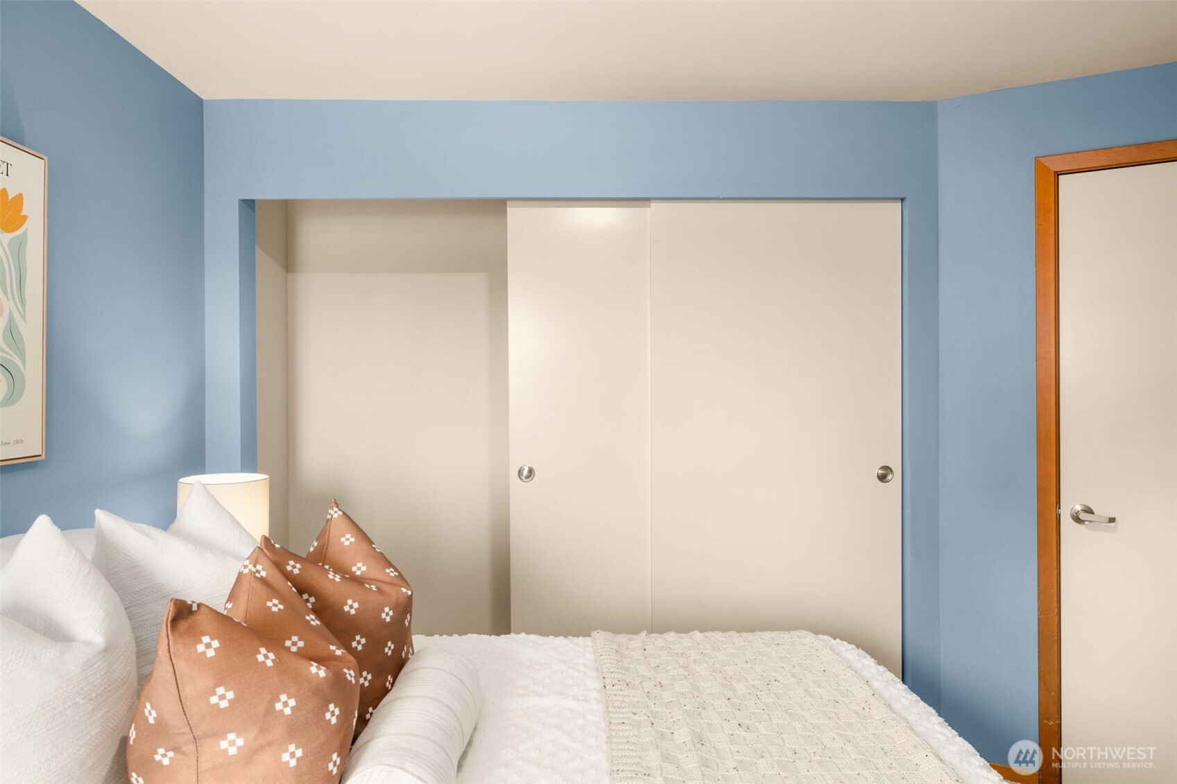 The spacious bedroom is designed for restful nights and lazy weekend mornings. Wake up to sunny vistas!