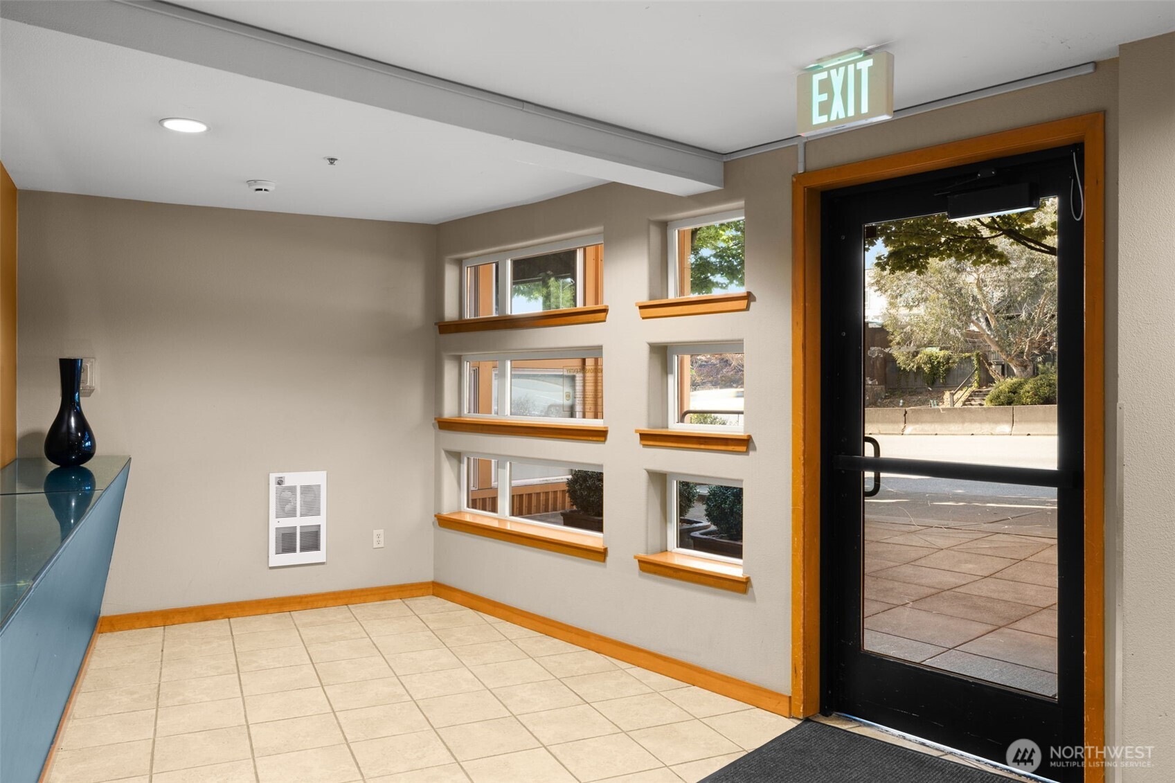 Secure garage entry off low-traffic back alley.