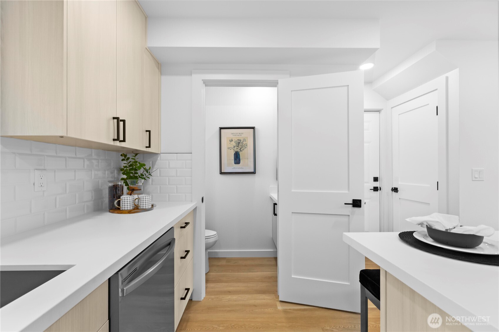 Kitchen with convenient Half Bathroom