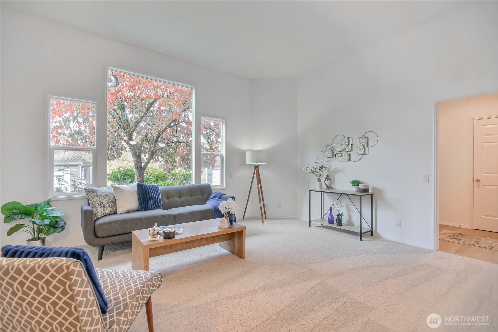 Completely updated kitchen with granite countertops, high ceilings, new appliances, luxury vinyl plank floors and open to living and dining rooms.