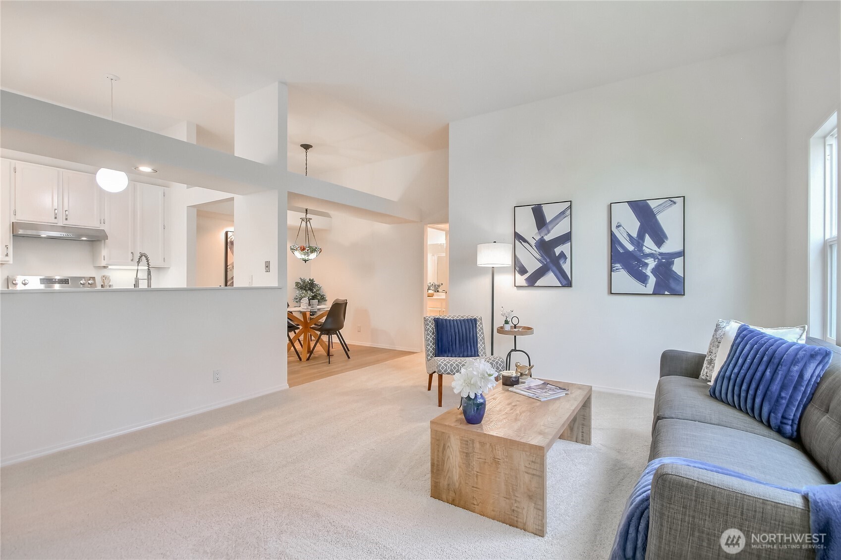 Living Area open concept high ceilings.