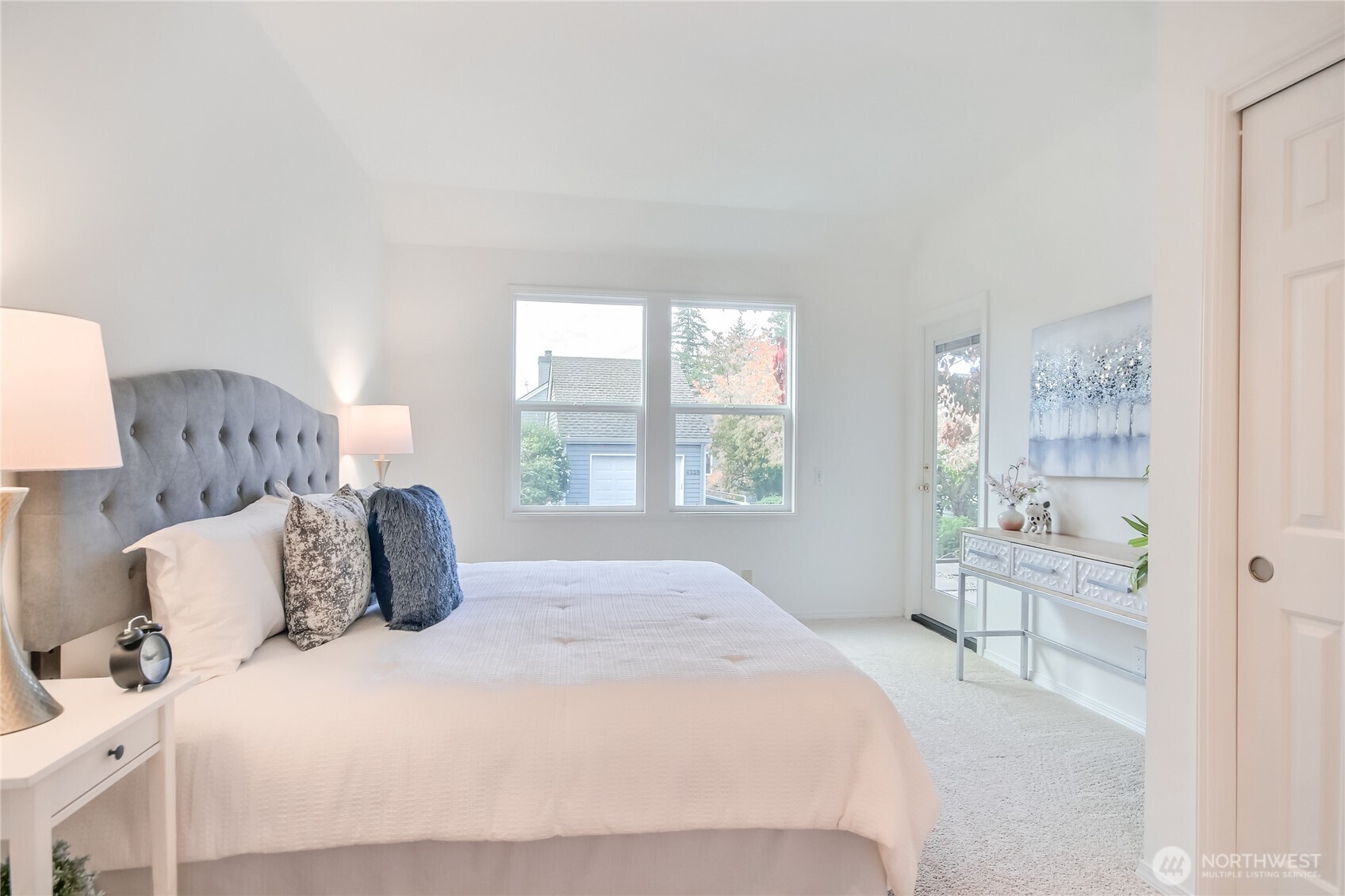 Bedroom with two closets, private door to patio, nice window space and high ceilings.