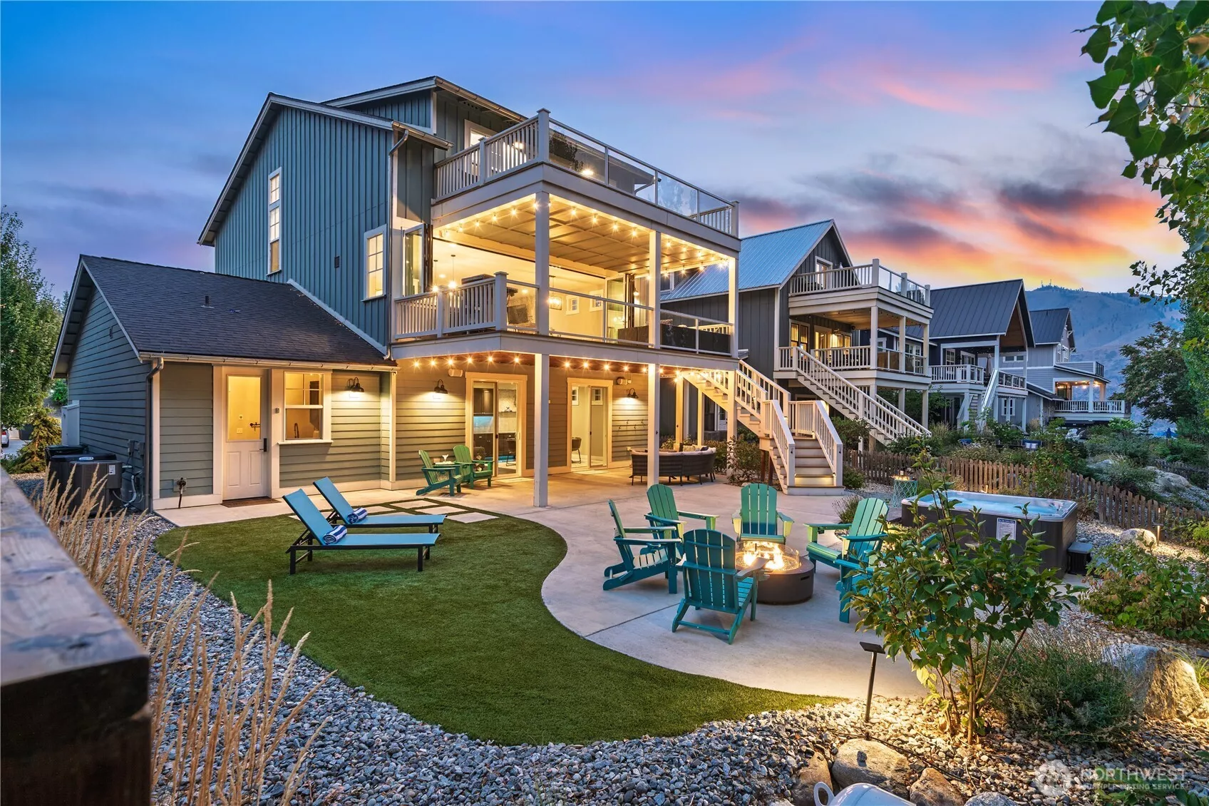 Exterior twilight view of outdoor living area.