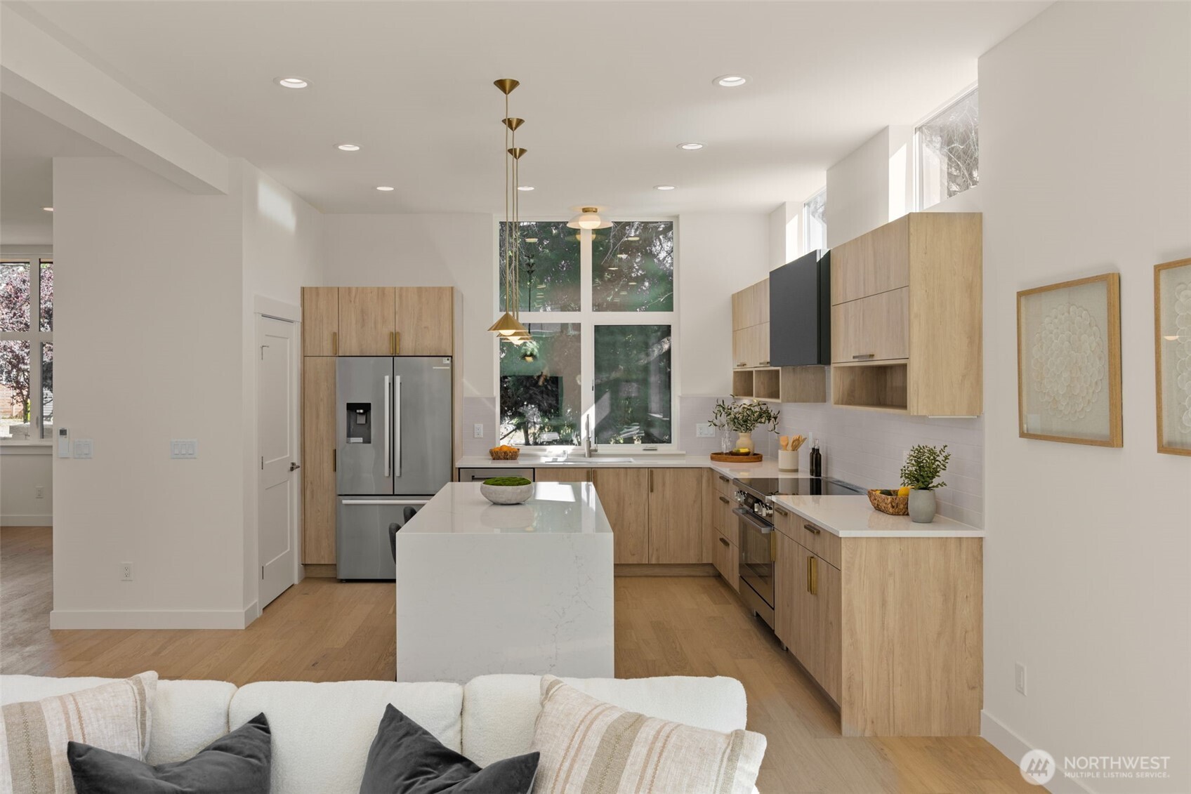 Gourmet kitchen with custom cabinetry.