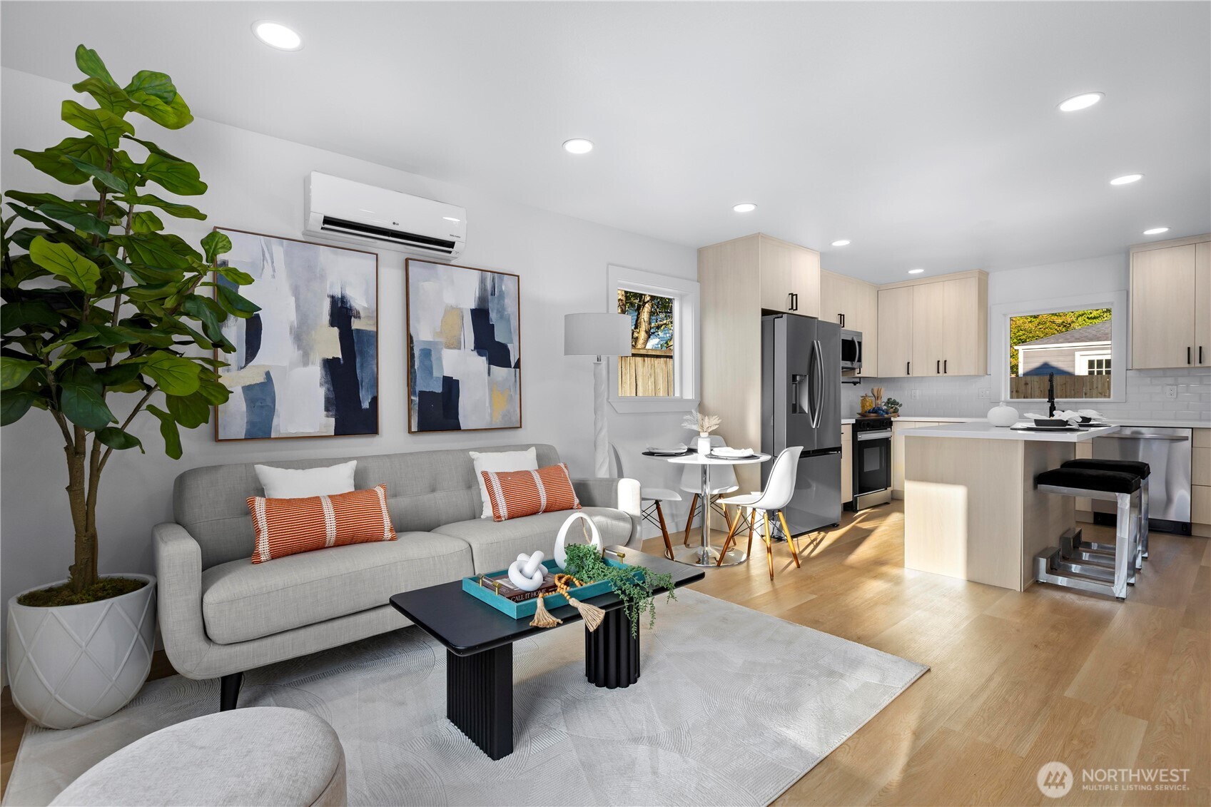 Open floor plan living room, dining room/ kitchen w/ LVP flooring