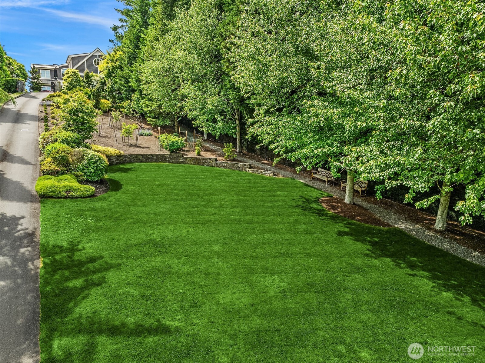 This estate has two separate tax parcels and addressses. : 2409 and 2405- giving you optionality and privacy as you wish.