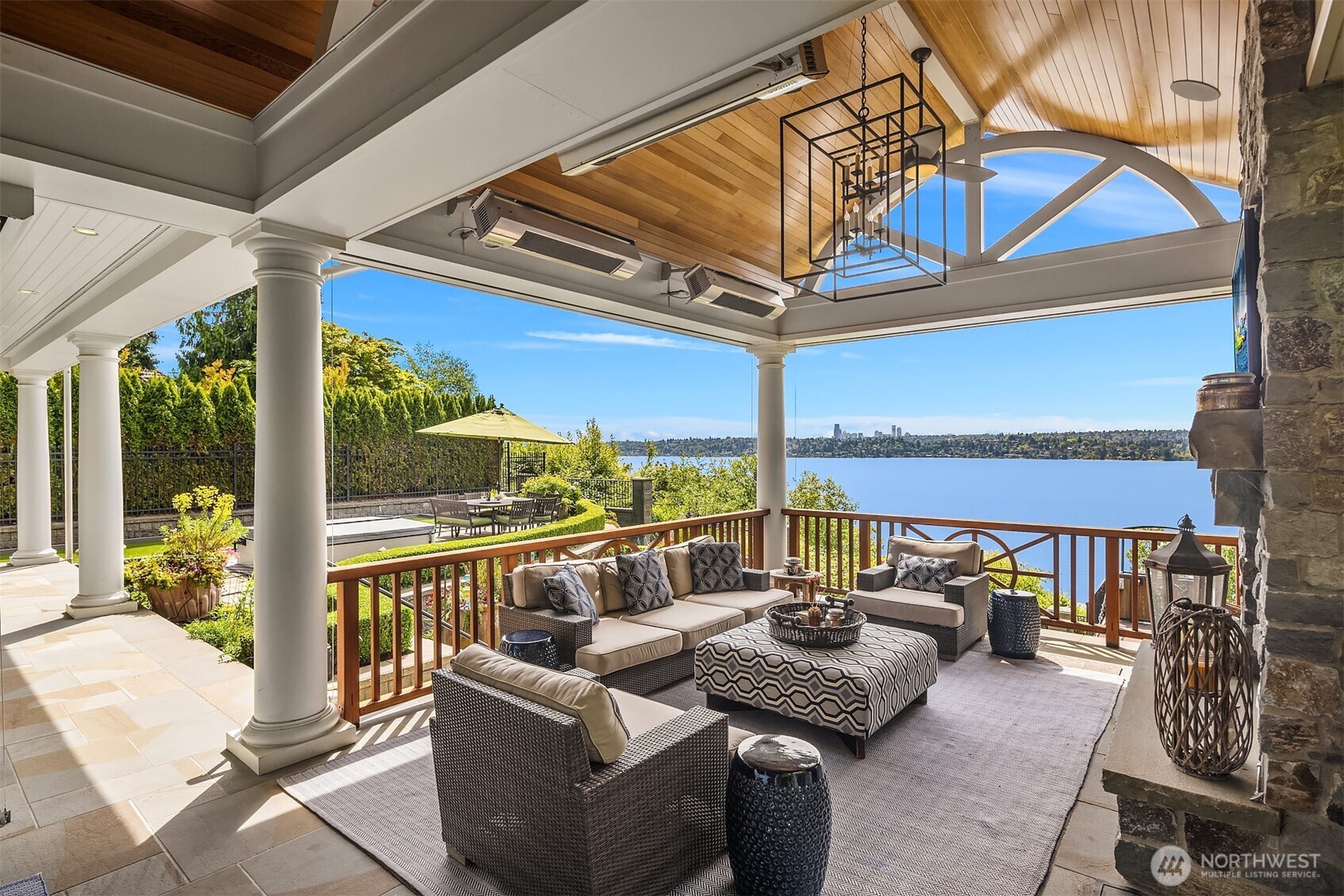 This covered and heated deck provides the perfect outdoor living space framing the waterfront beautifully. In addition to heaters it has drop down shades to ensure you can enjoy it rain or shine exactly as you wish!