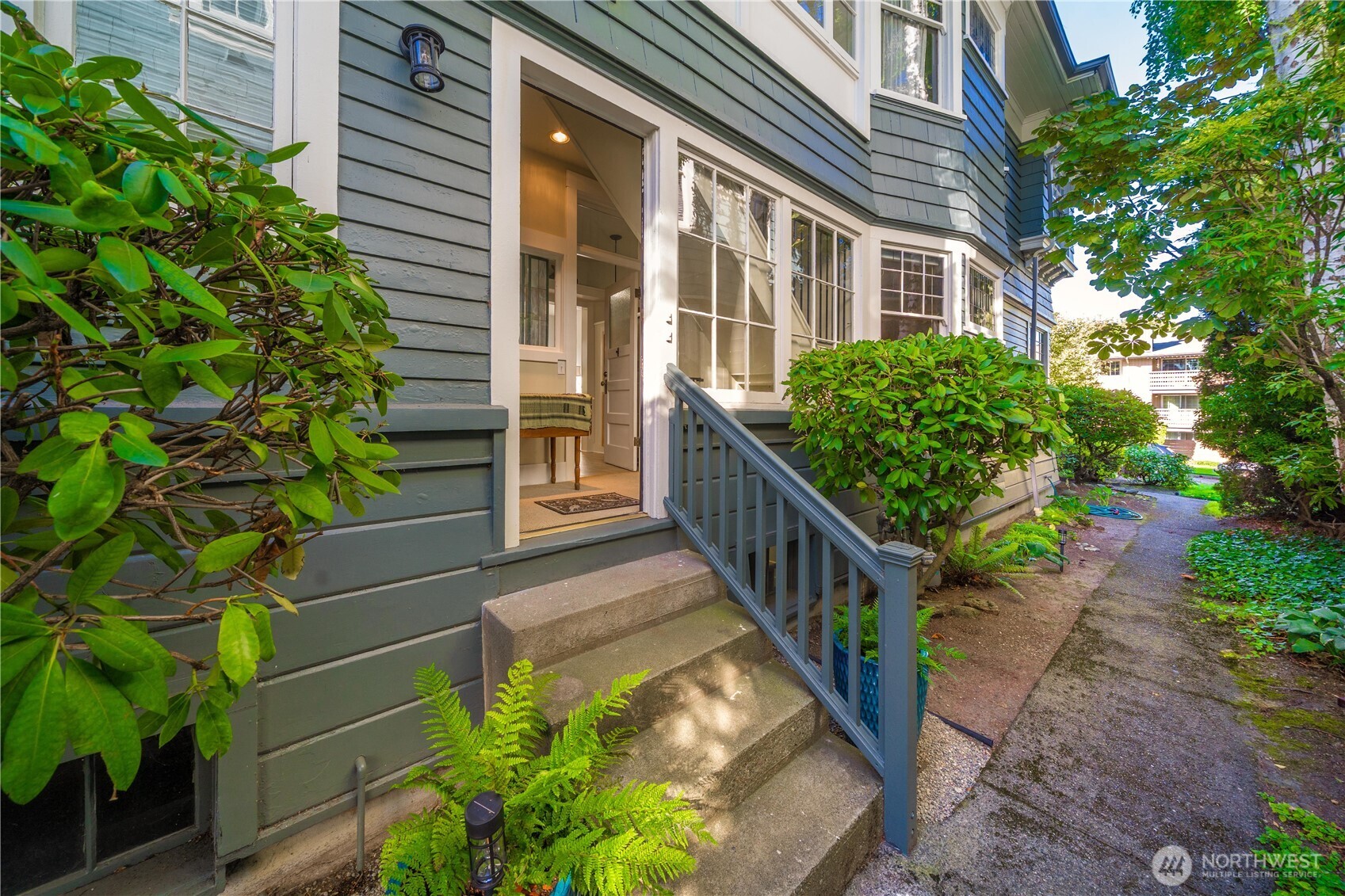 Mud-room/Side Entrance to condo.  From here there are stairs down to the basement.