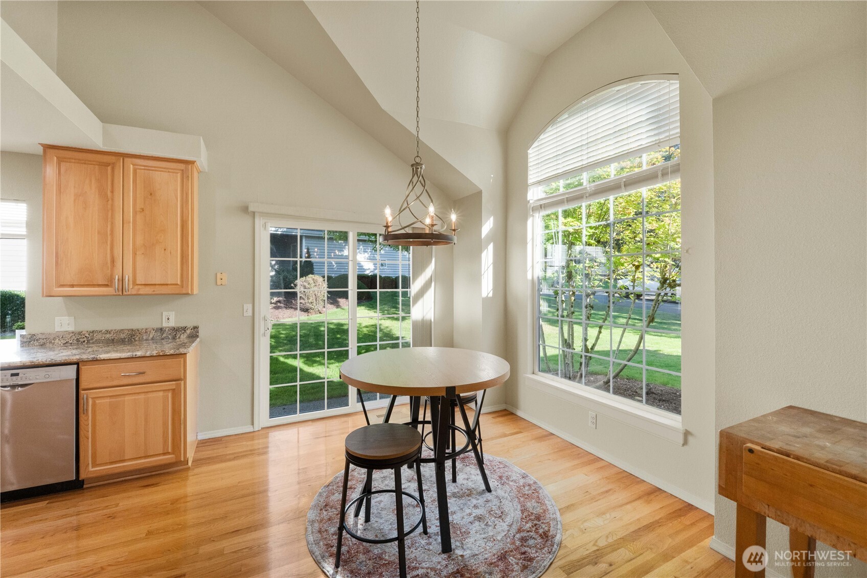 Beautiful Entry with custom staircase- check out the lighting!