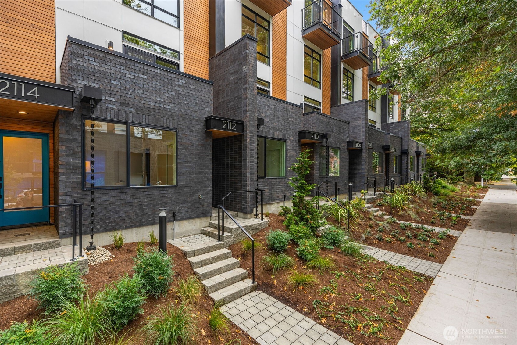 Open floorplan with soaring ceilings and windows to match.