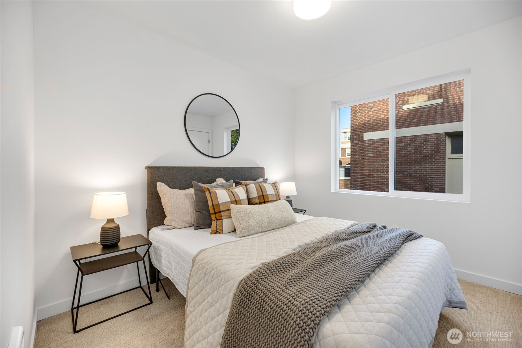 Third level bathroom.  Photo is of model home of same floorplan. Color schemes of finishes may vary.