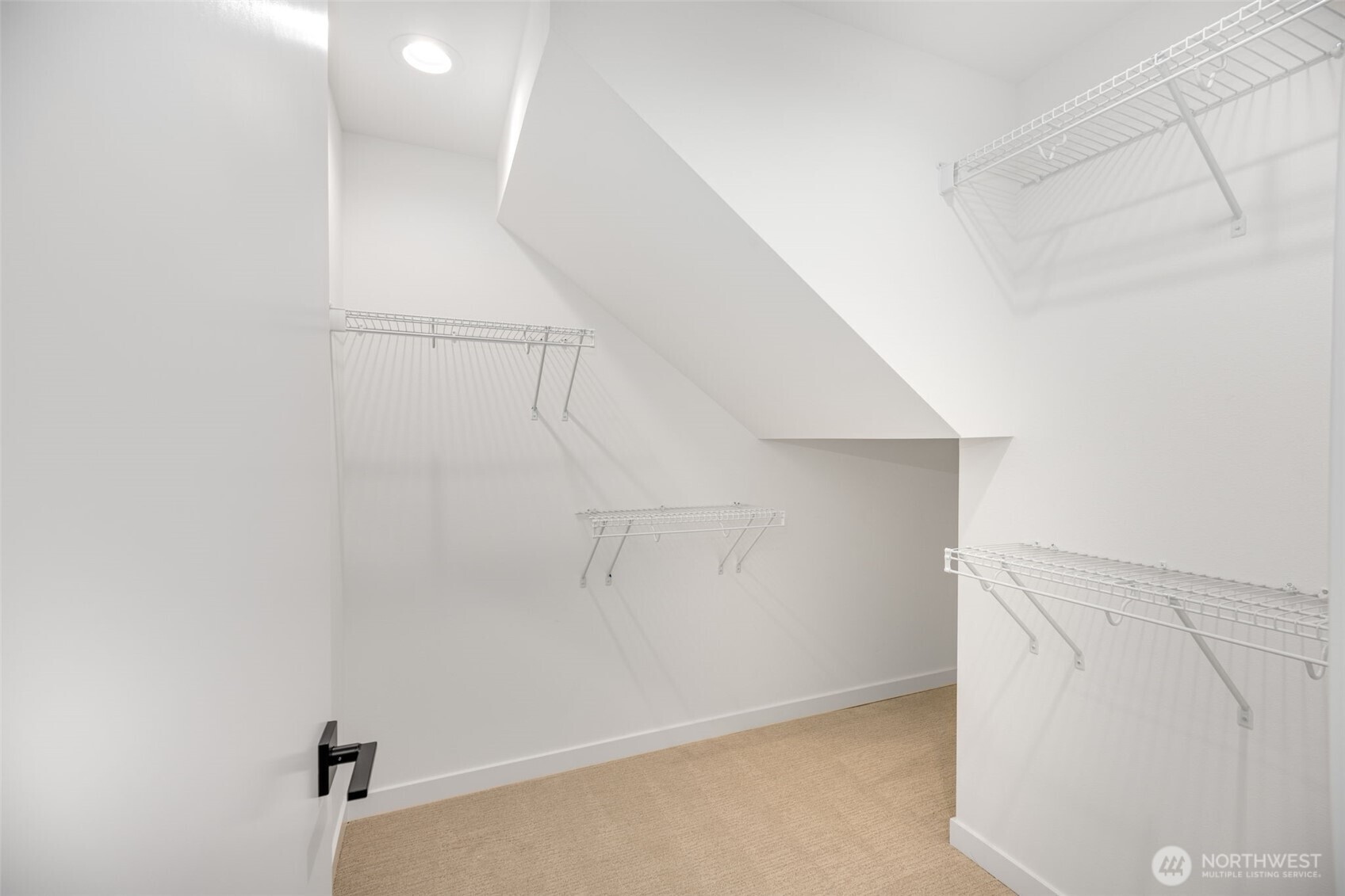 Primary bathroom offers dual sink vanity, ample countertop and storage space! Photo is of model home of same floorplan. Color schemes of finishes may vary.