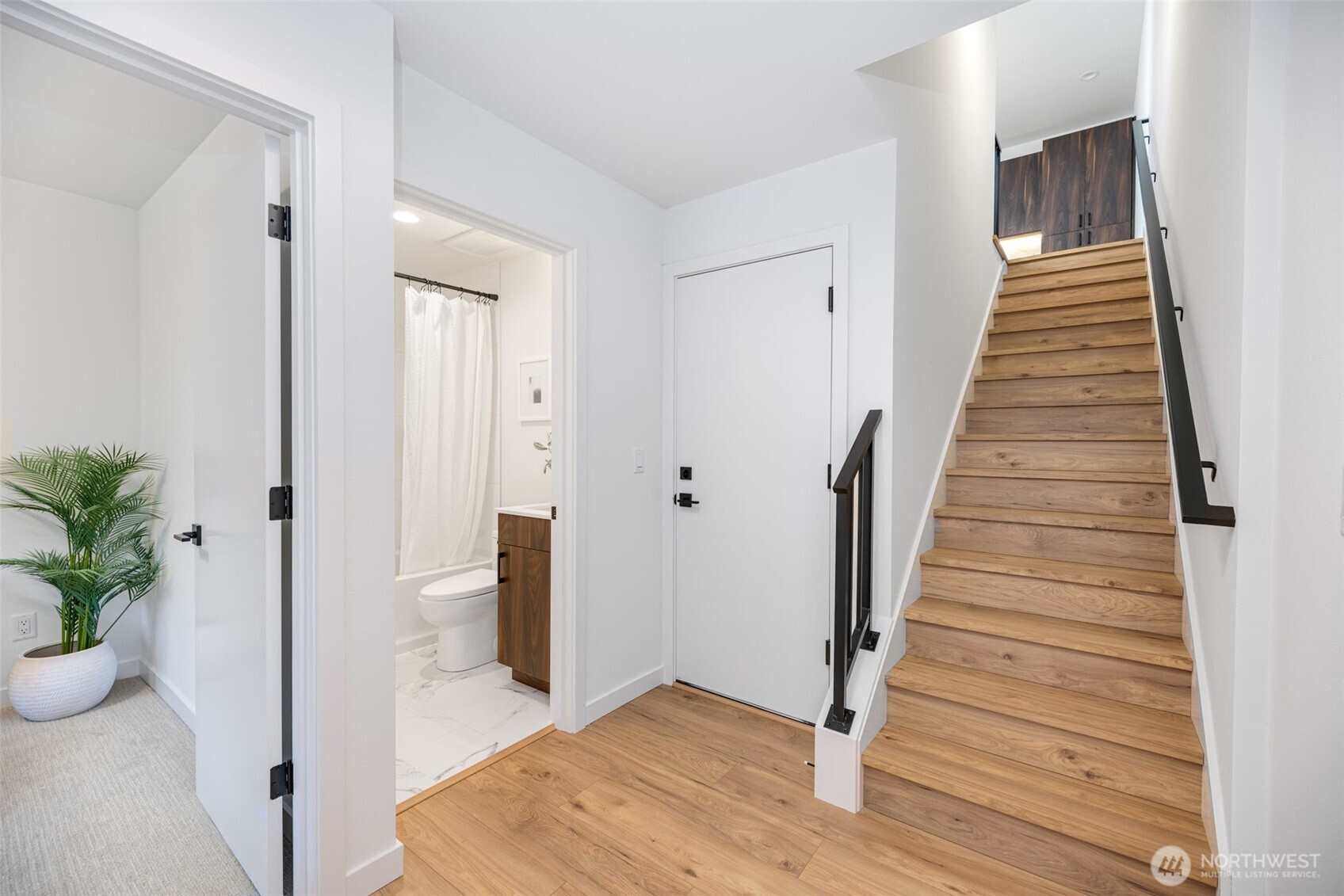 Lower level features bedroom/full bathroom. Door steps in/out to attached one car garage!