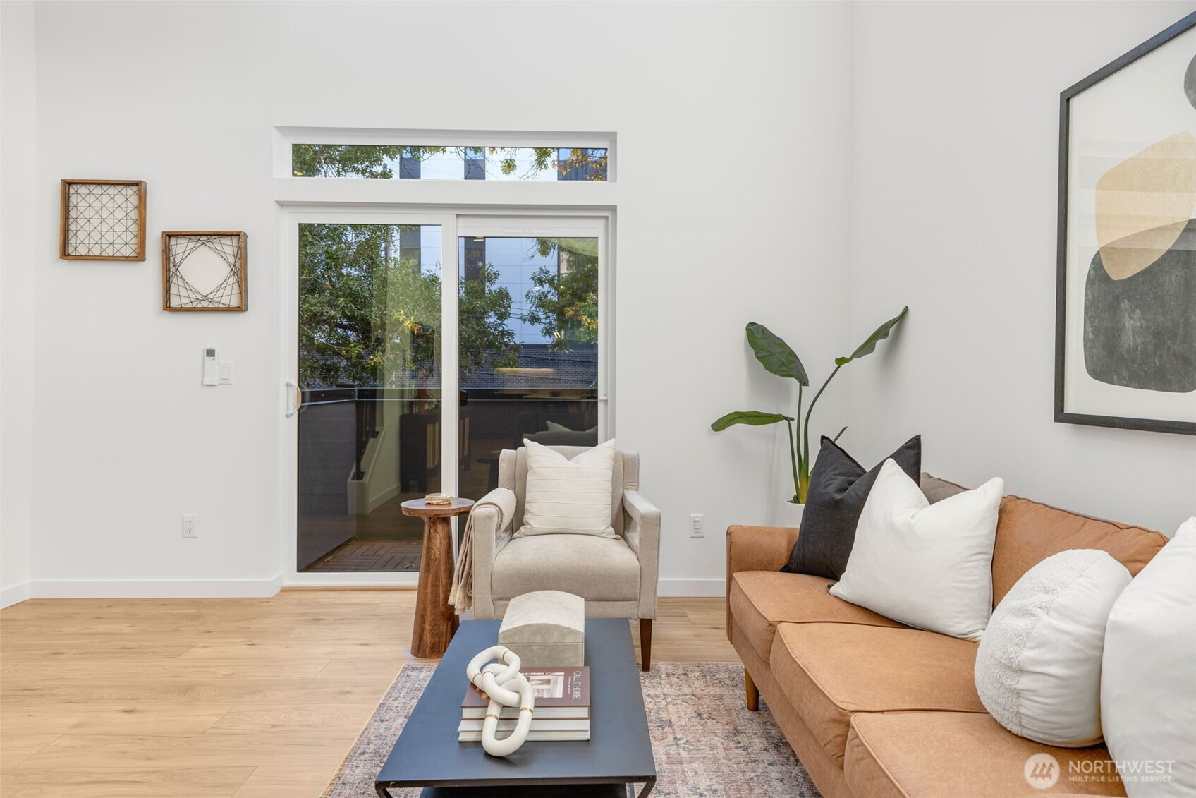 Lovely view from walkout balcony.  Photo is of model home of same floorplan. Color schemes of finishes may vary.