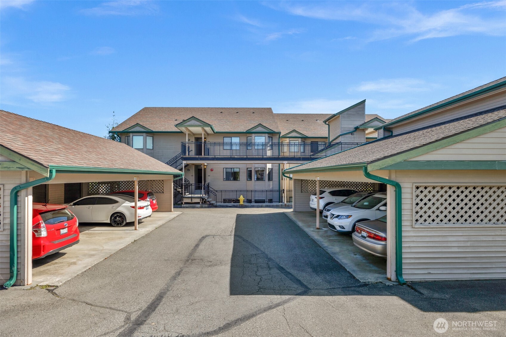 Quiet downtown location for this ground level condo in an over 55 complex. Elevator for access to all units.