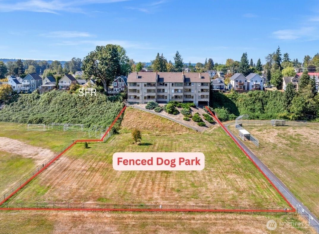 Fended dog park area between the soccer fields.