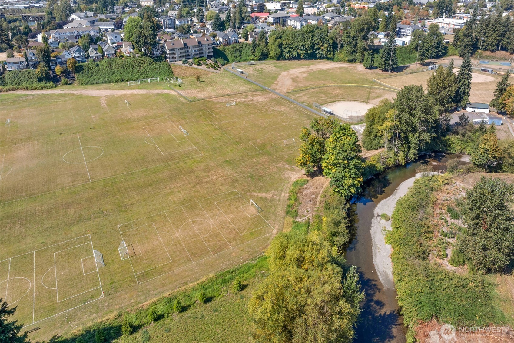 There is gated access for condo owners to the Snohomish river, relax, read a book or cool off by the water.