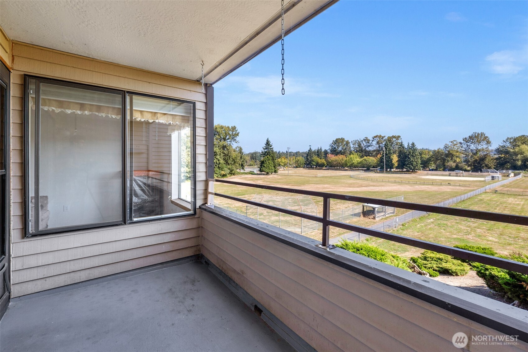 Covered deck off the dining and living rooms, an ideal place for your morning coffee.