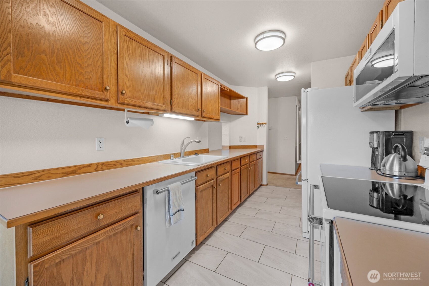 Terrific counter space in this kitchen which has newer Kitchen Aid appliances.