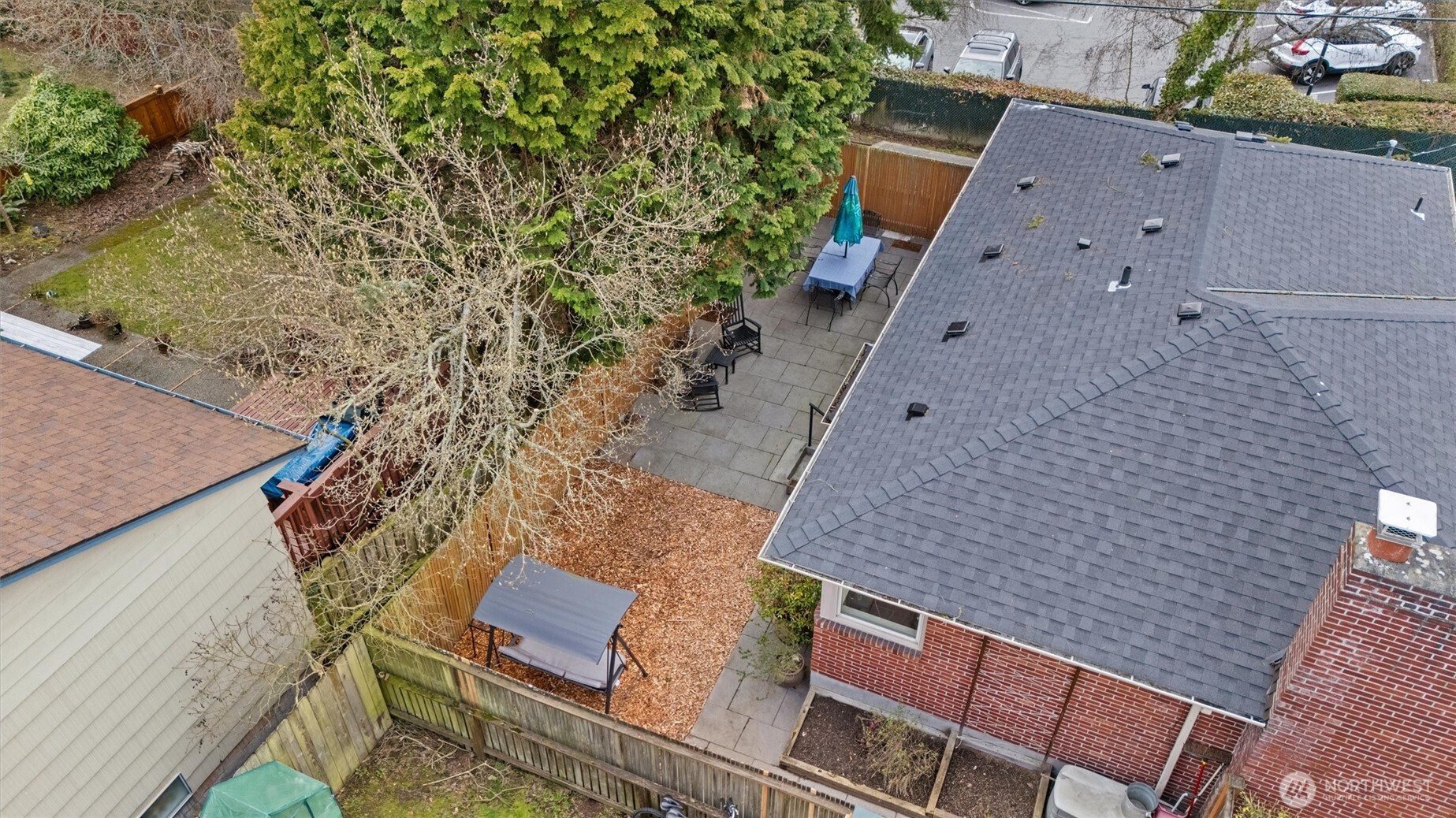 Check out the new roof! Worry-free home that has it all. Drone photo of the house perimeter and back yard.