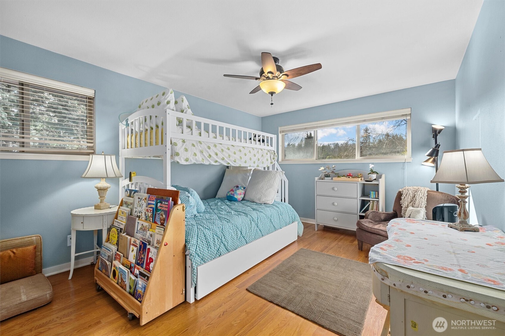 Bedroom, one of two on the main floor. Each bedroom has fitted closets for organized storage.