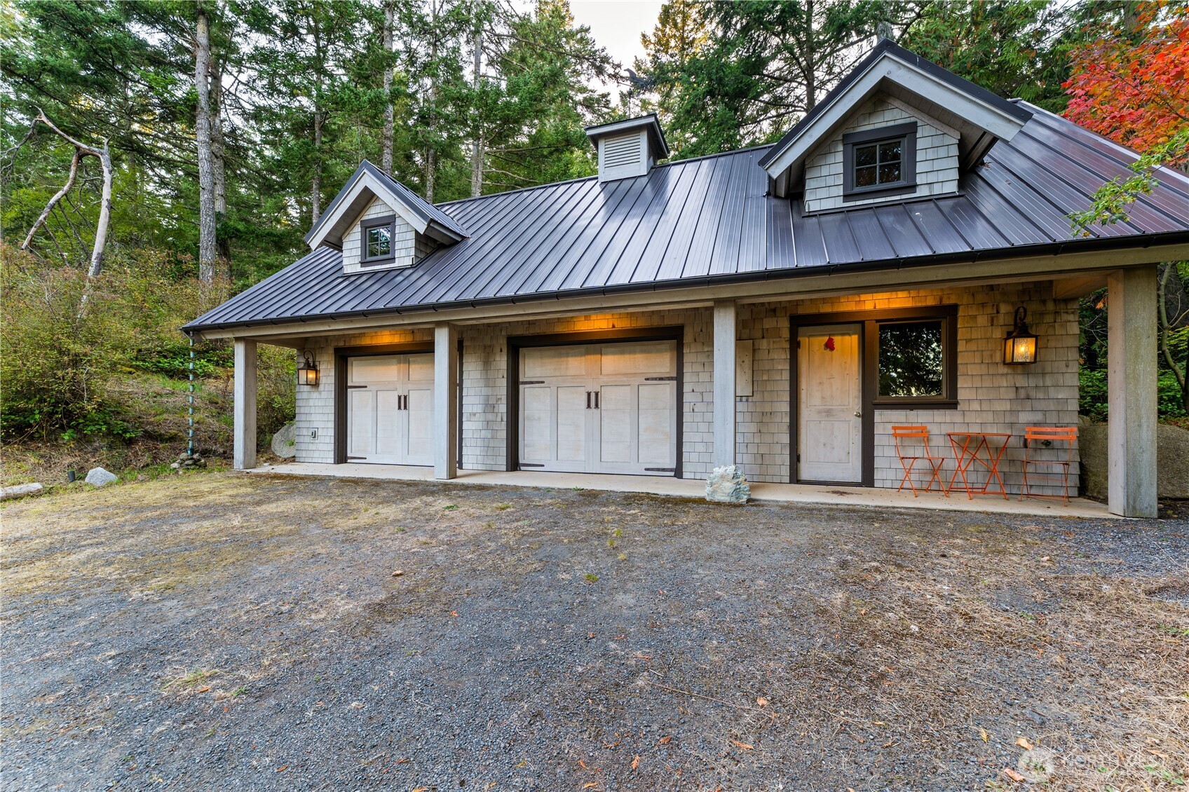 895 SF two car garage with studio guest suite to the right side.