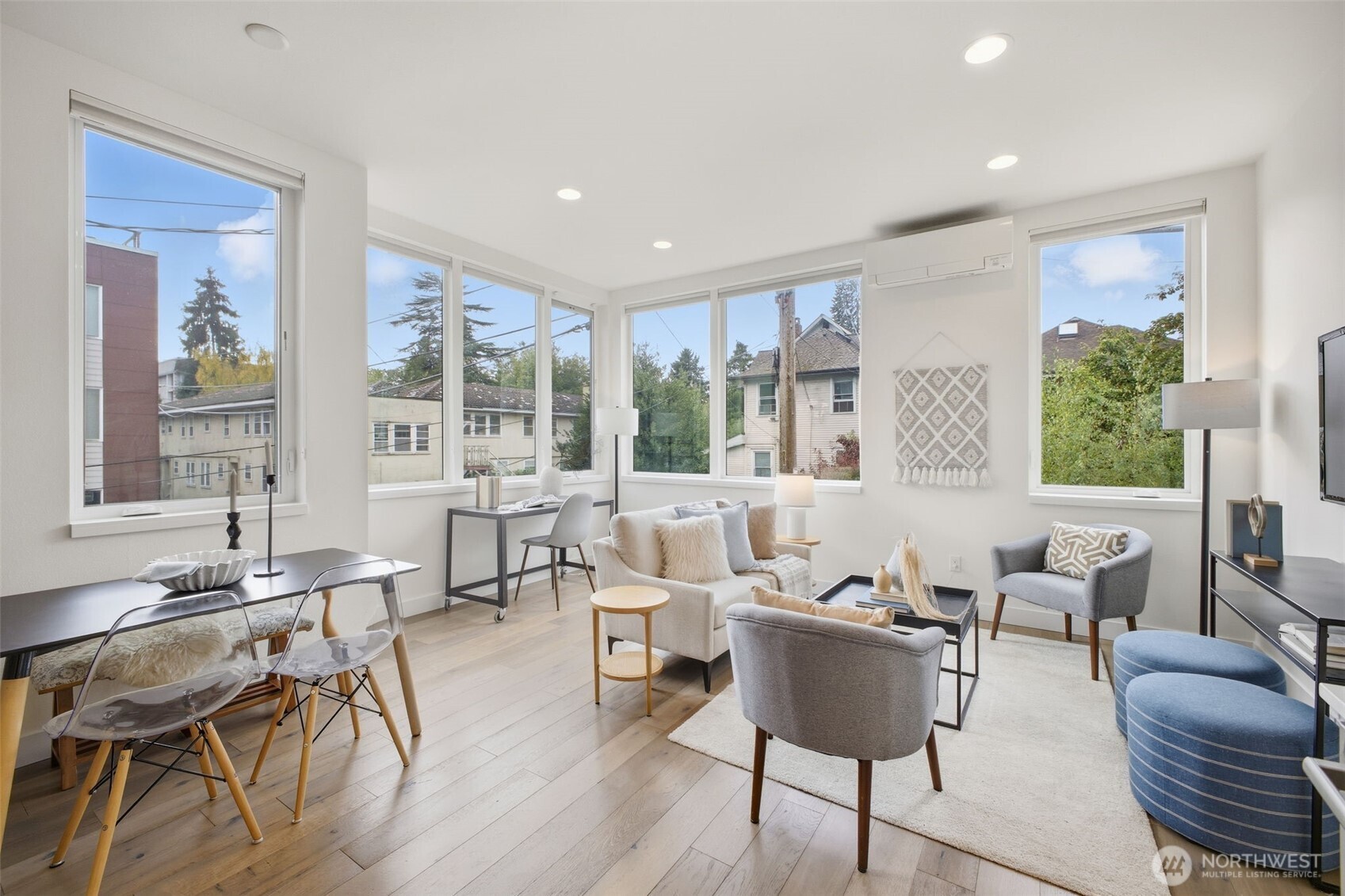 Your wide open main level w/room for sitting area, dining & WFH space with great light