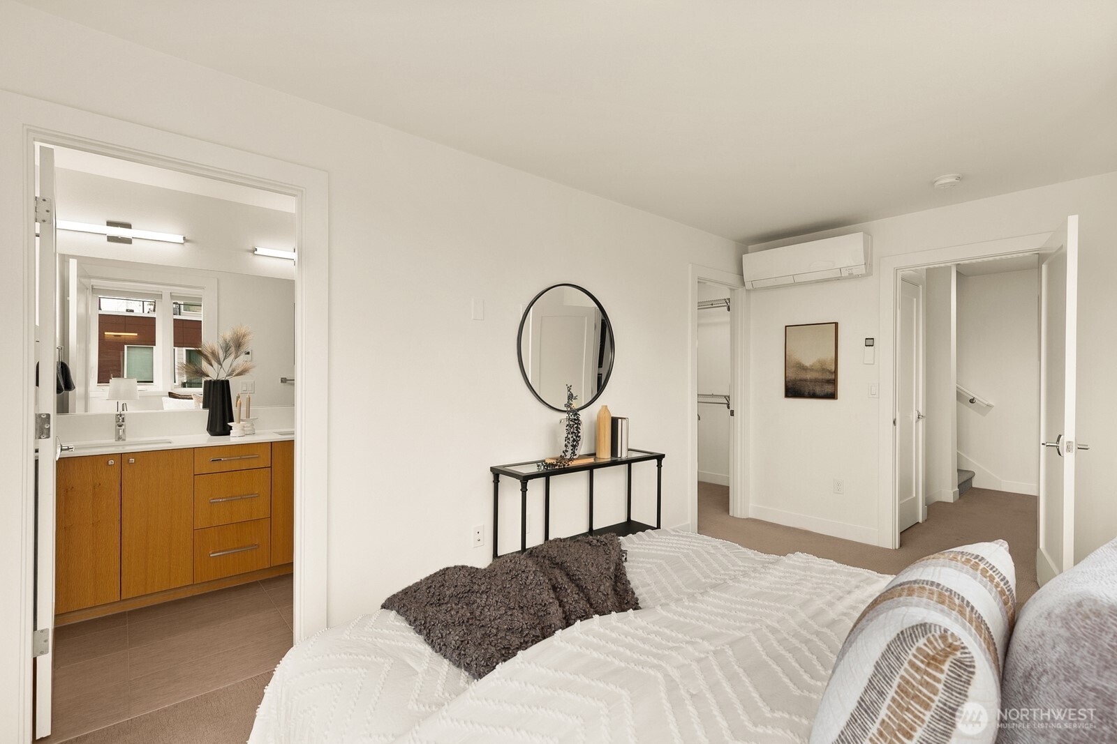 Primary suite upstairs full of light