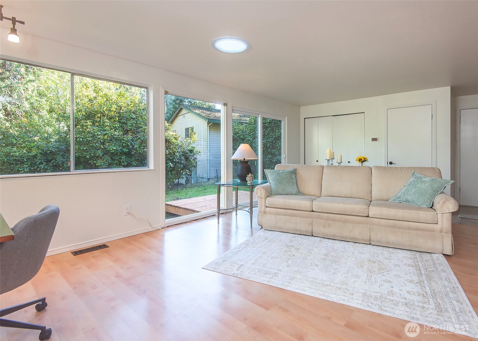 Great room looking to deck and laundry.