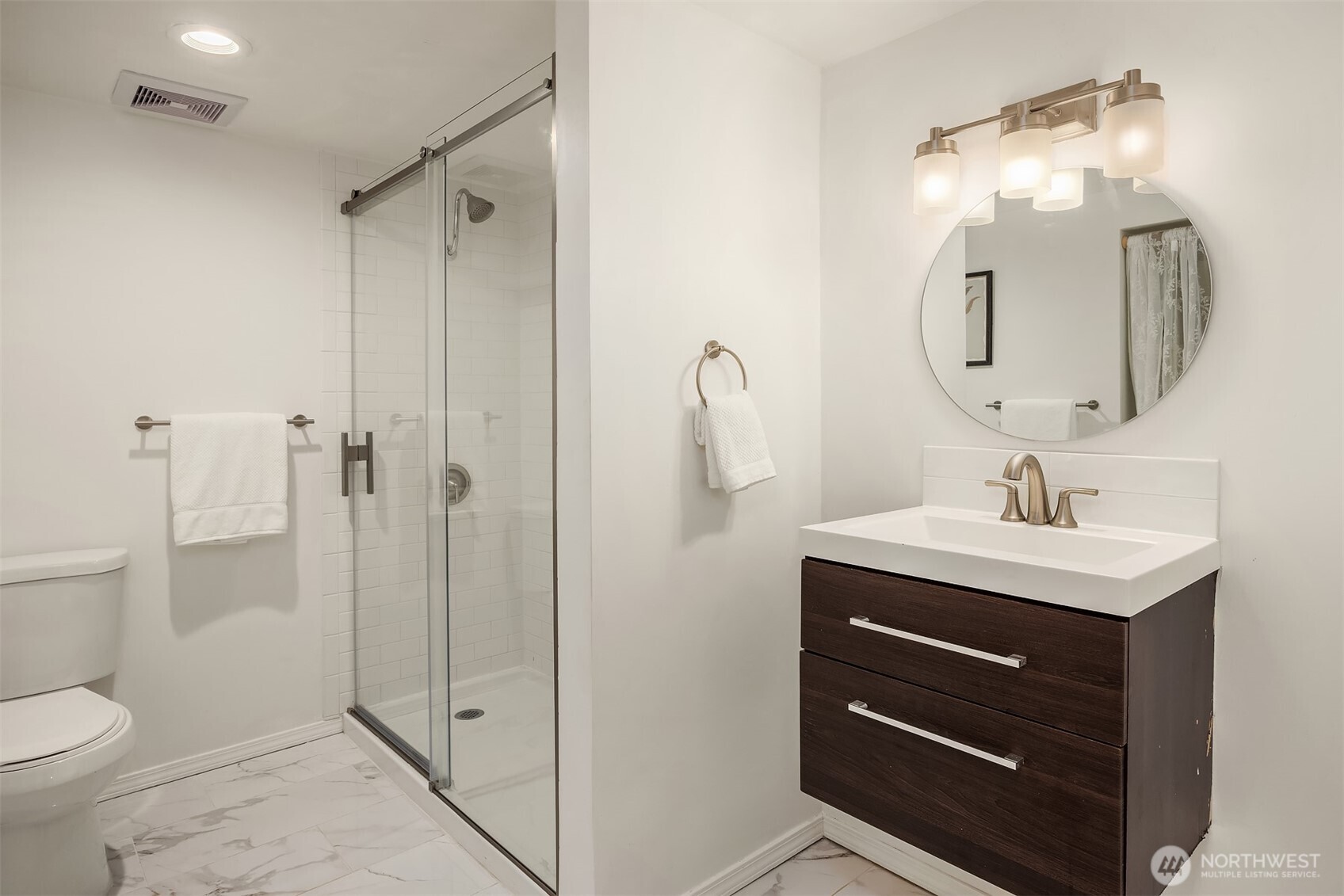 A huge back deck and easy access to carport