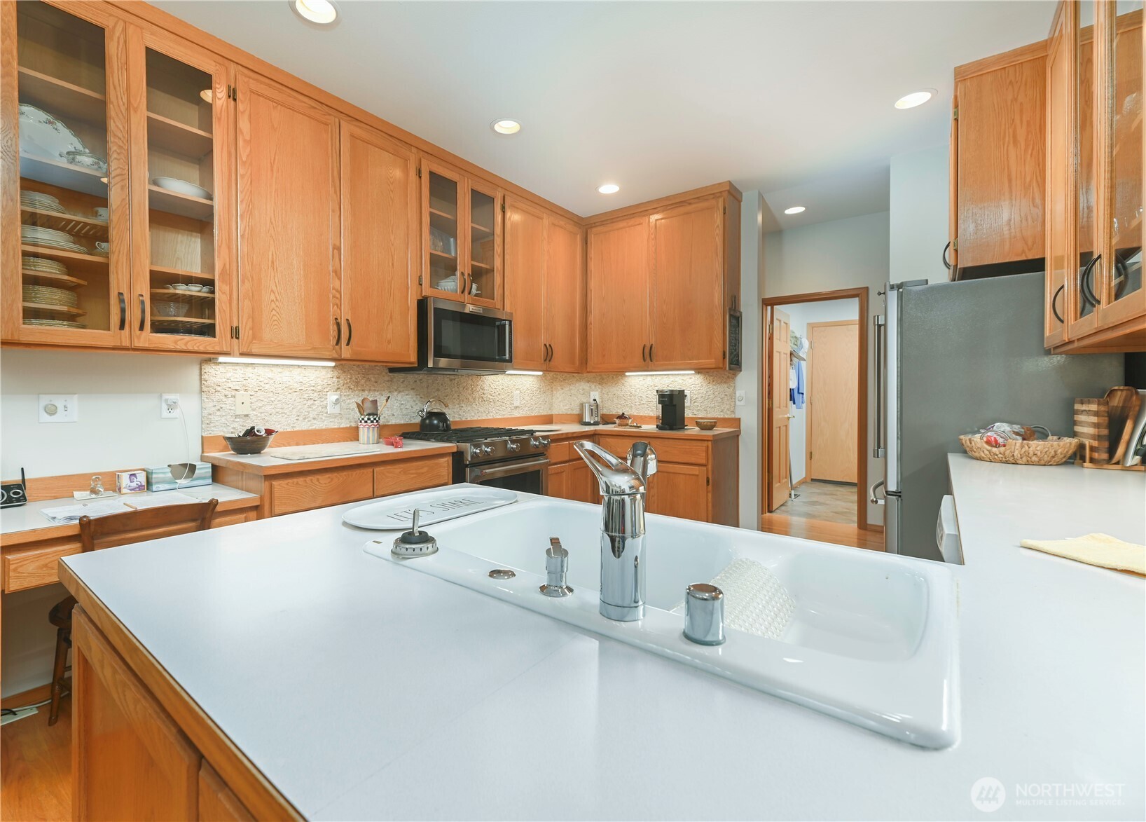 Great kitchen with ample cabinets and counterspace.