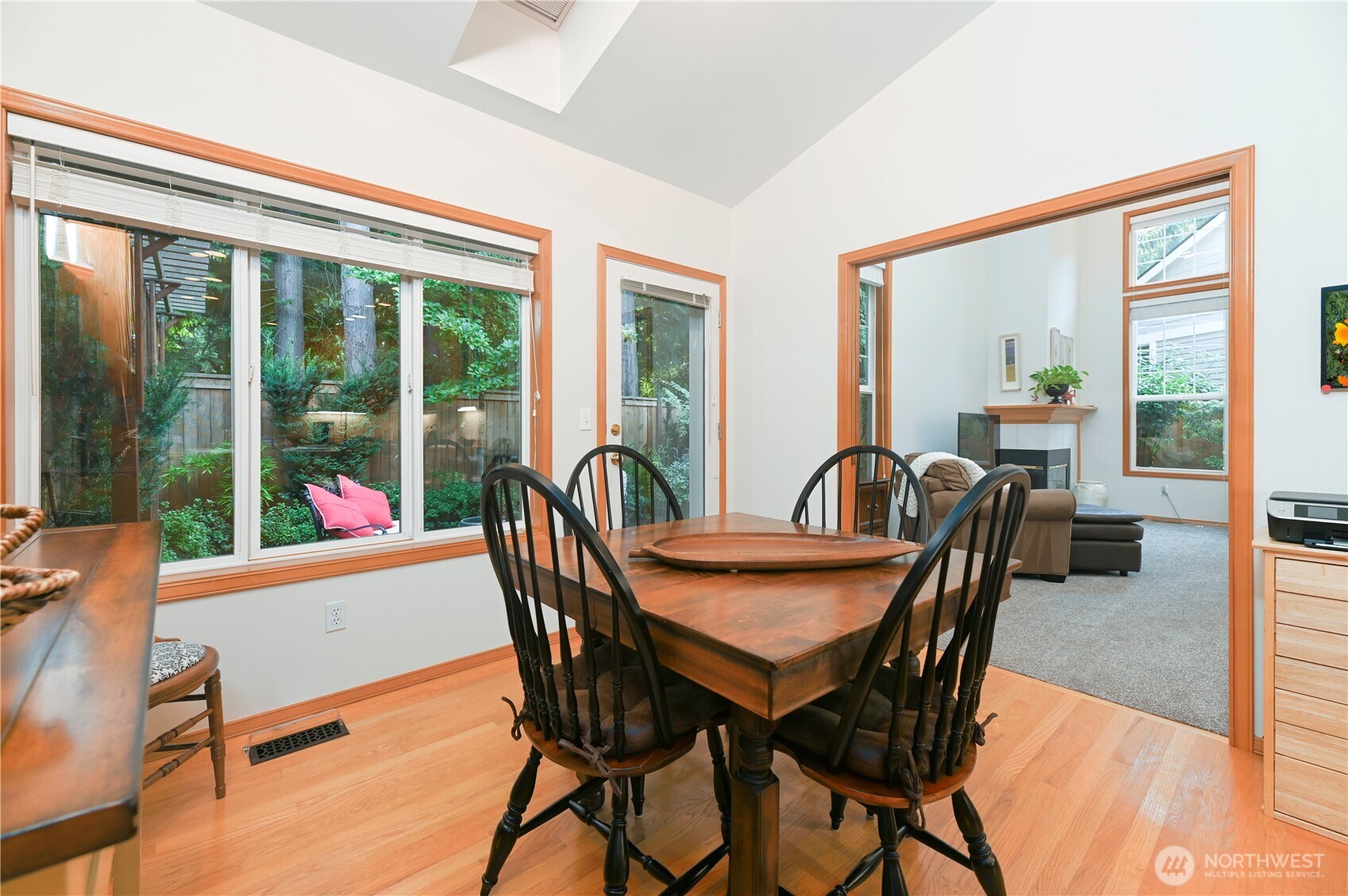 Pocket doors open to the living room, living room is large and there is room for additional dining table.