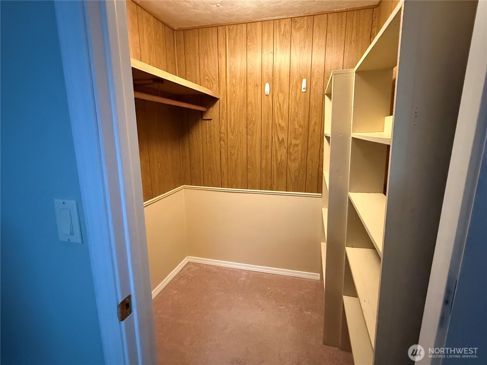 Walk in closet in guest bedroom