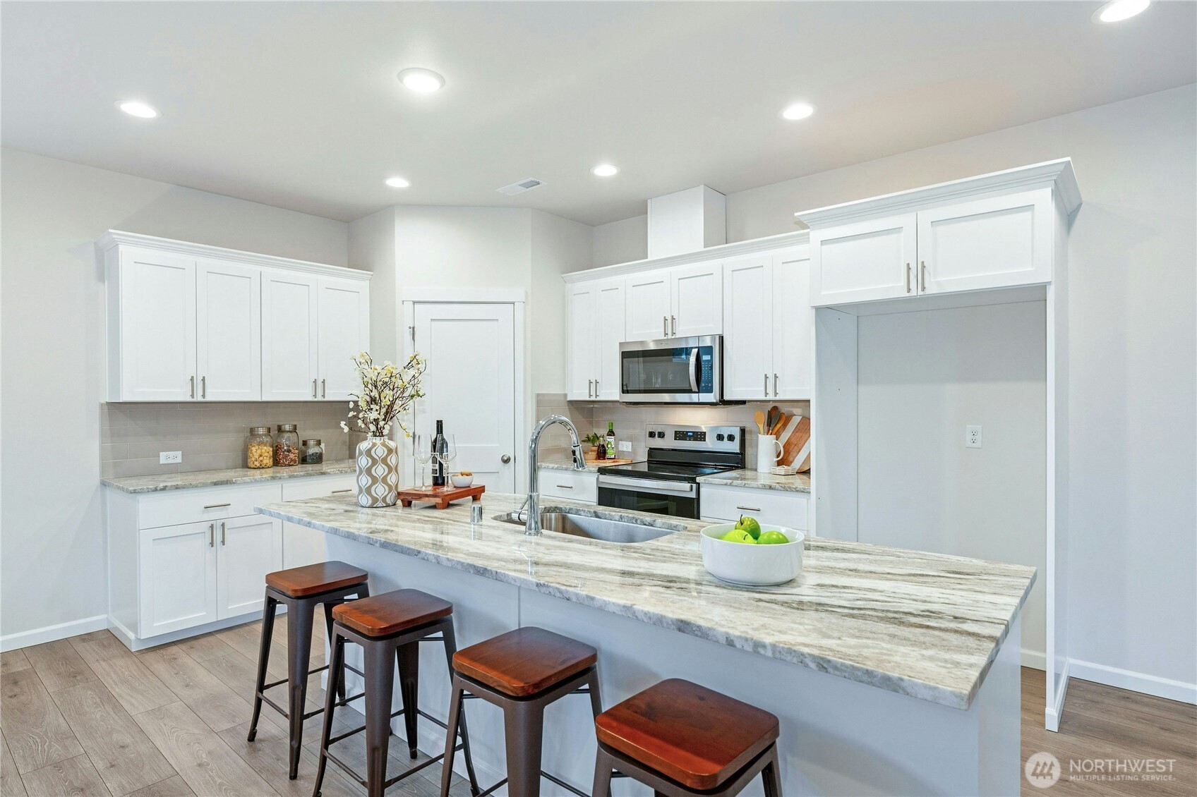 **Lot 13 is a presale** Photos are of the same floorplan in the community. Some features and colors will vary.