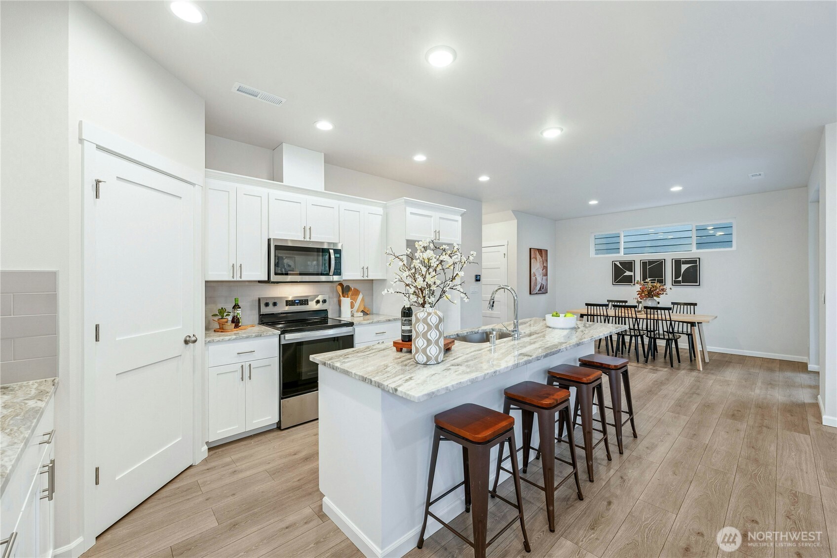 **Lot 13 is a presale** Photos are of the same floorplan in the community. Some features and colors will vary.