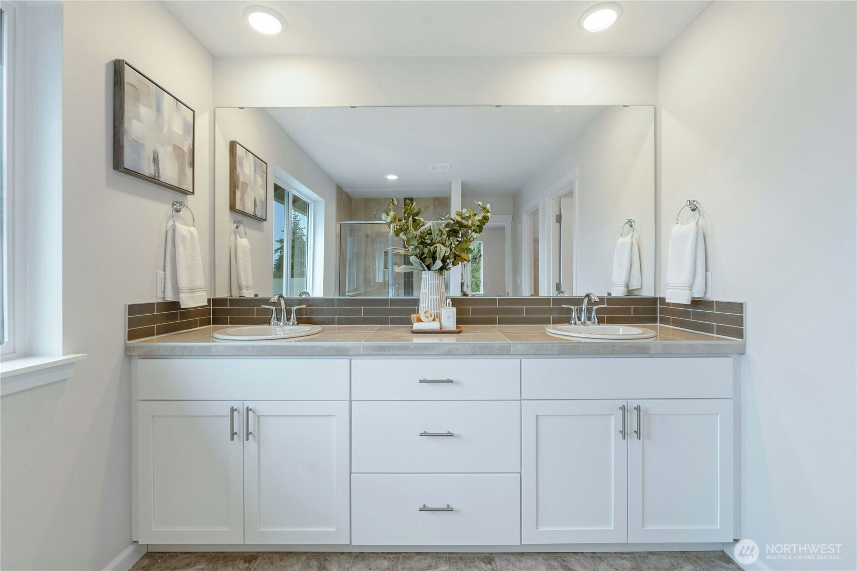 **Lot 13 is a presale** Photos are of the same floorplan in the community. Some features and colors will vary.