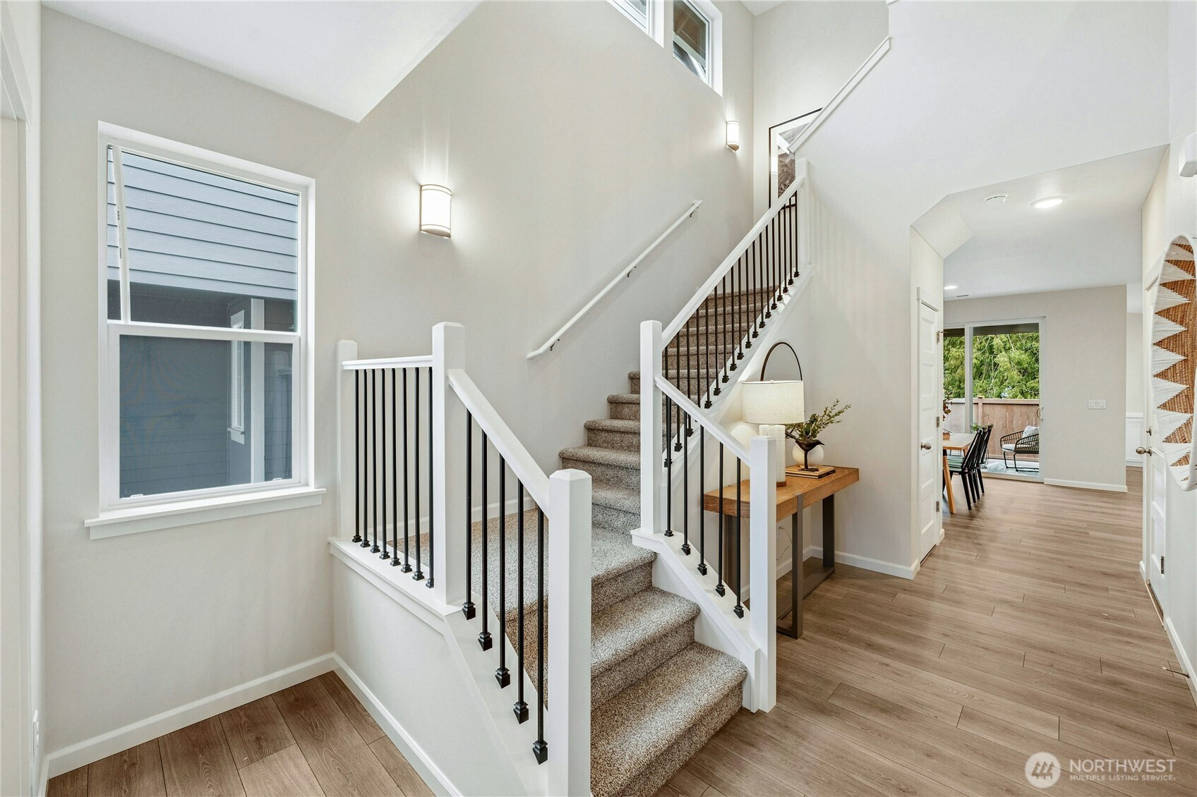 **Lot 13 is a presale** Photos are of the same floorplan in the community. Some features and colors will vary.