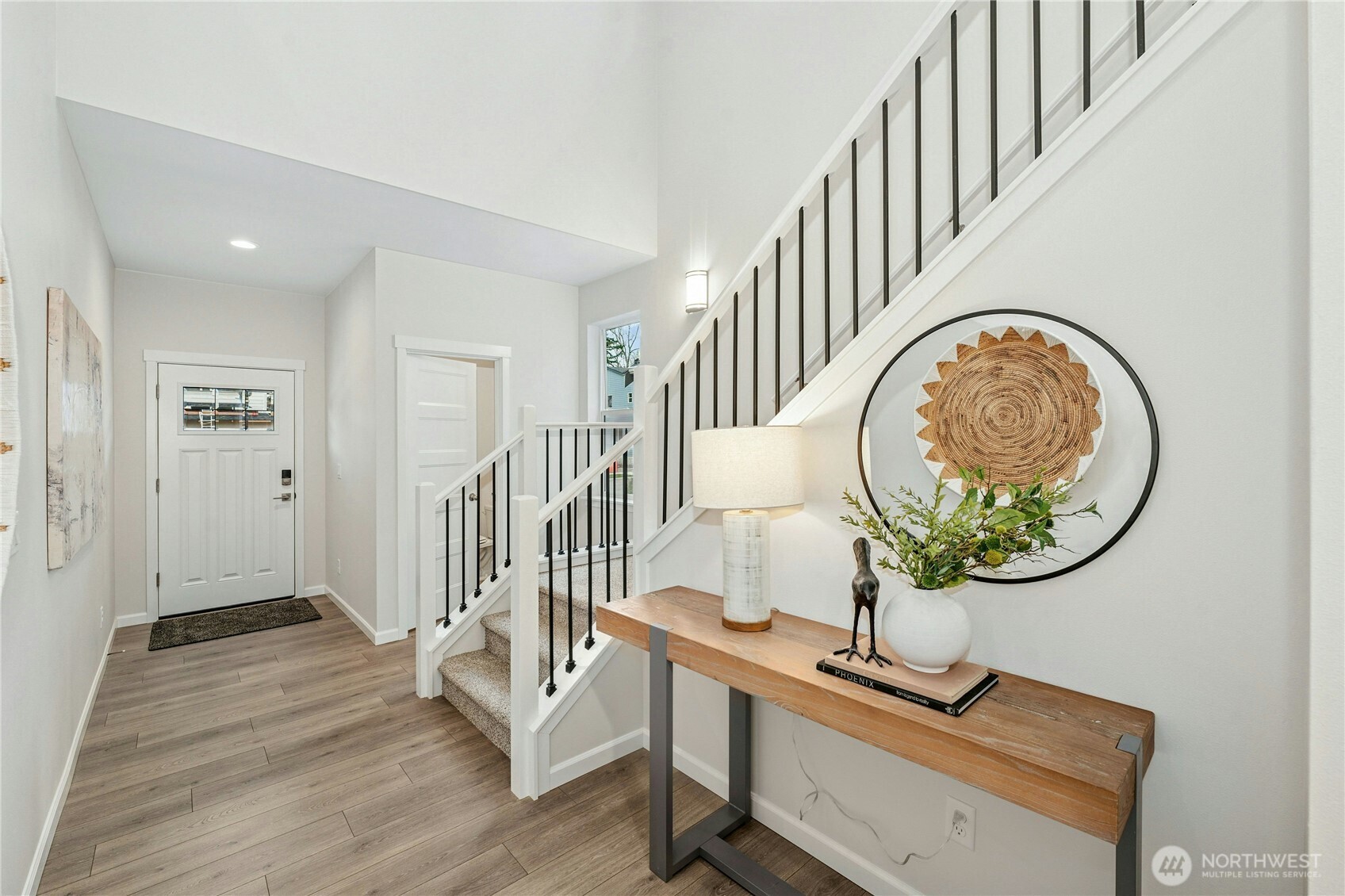 **Lot 13 is a presale** Photos are of the same floorplan in the community. Some features and colors will vary.