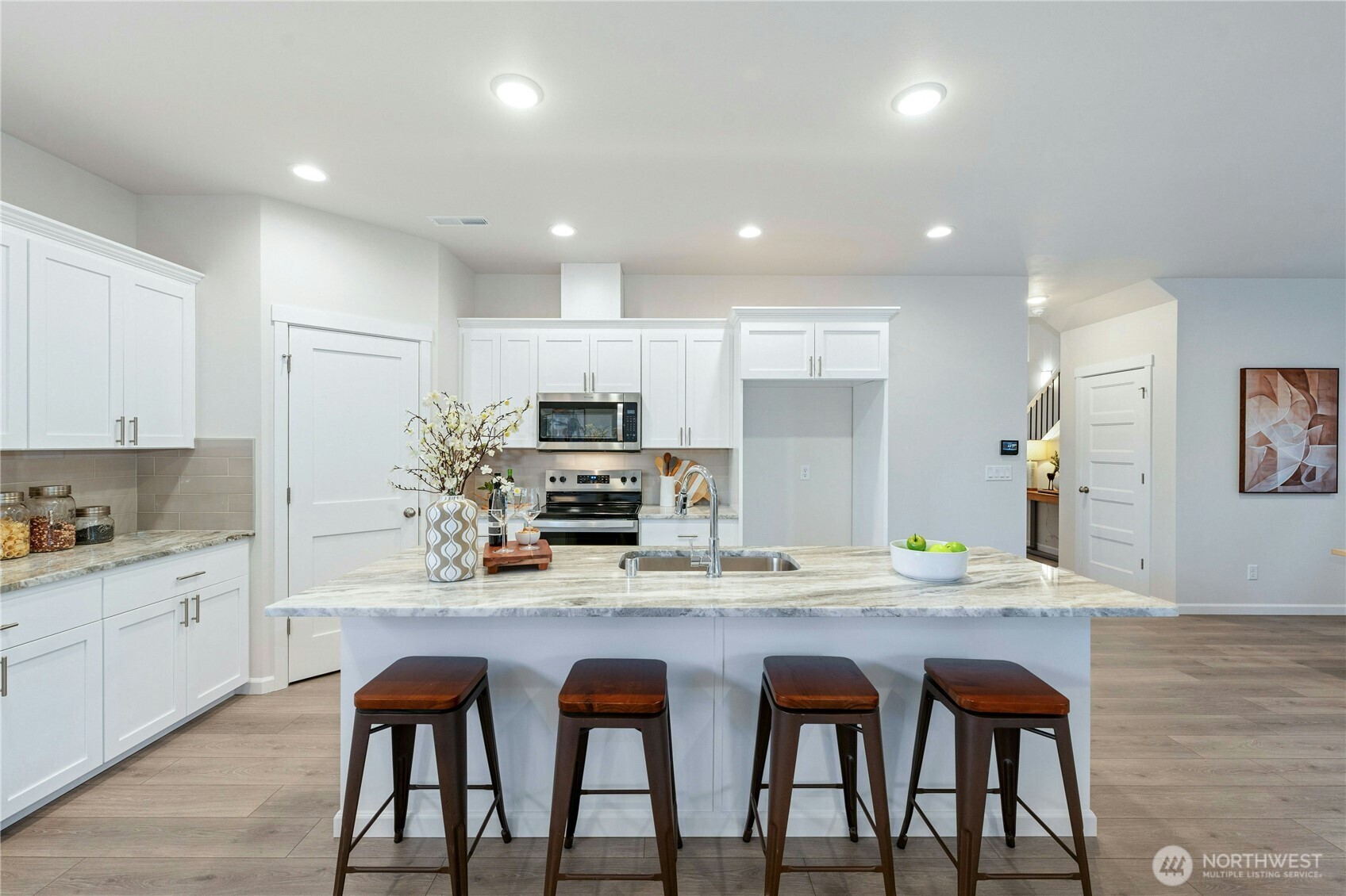 **Lot 13 is a presale** Photos are of the same floorplan in the community. Some features and colors will vary.