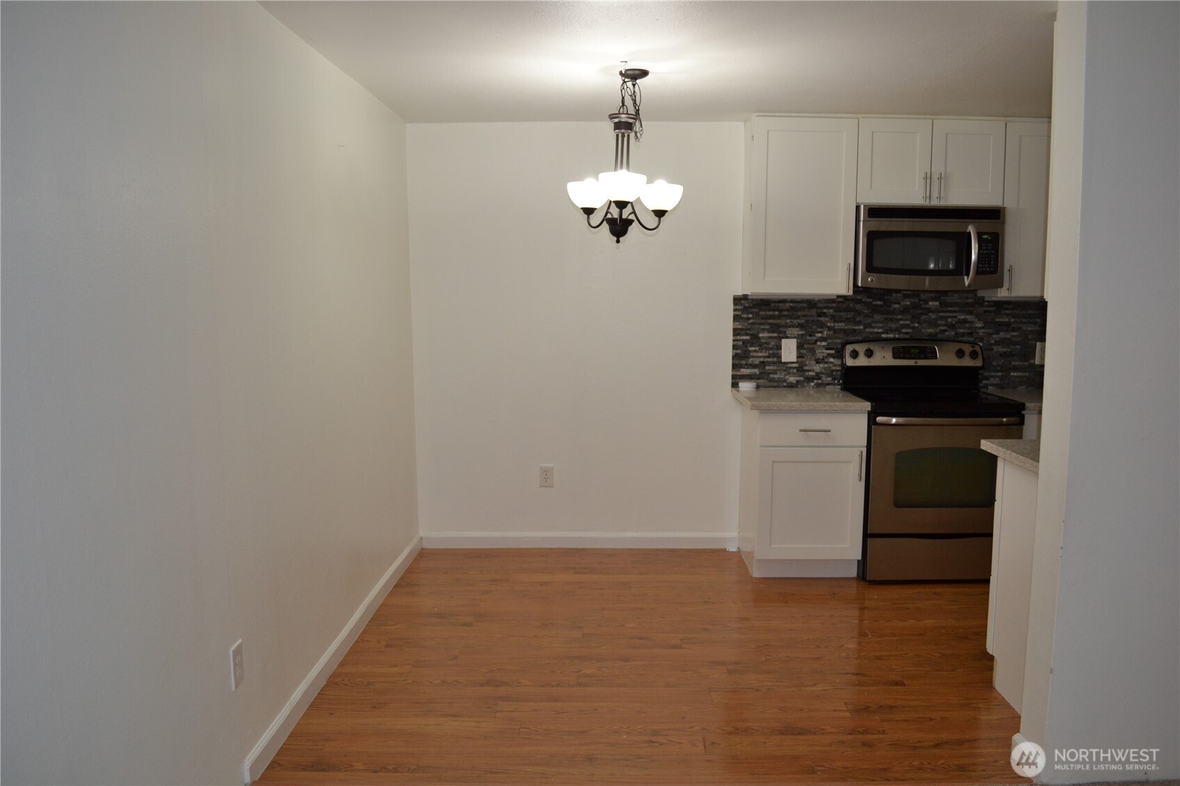 newer counters, backsplash & refridgerator