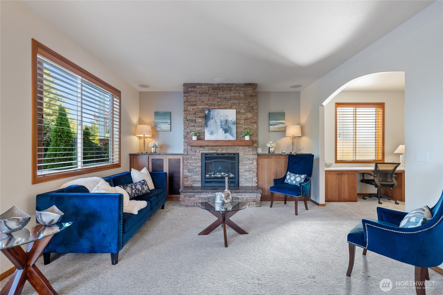 Big deck looking out at the well manicured yard