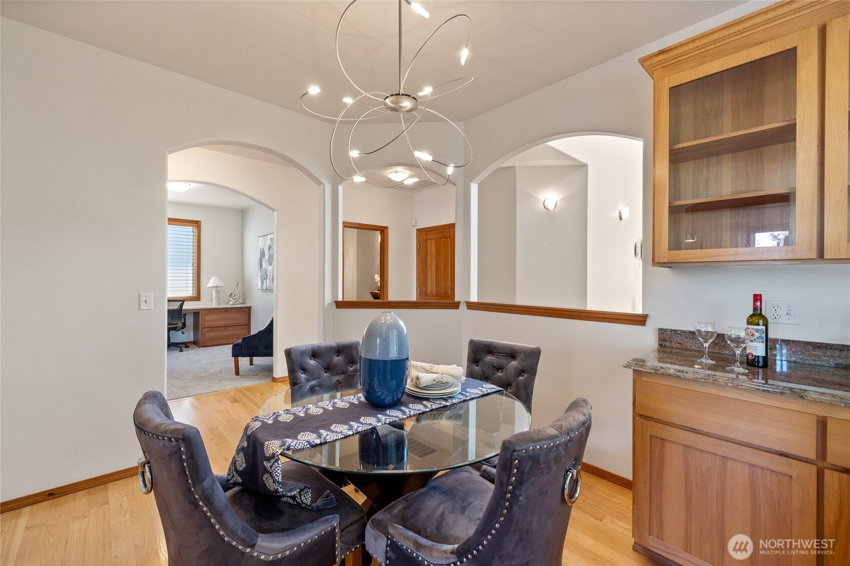The arched entryway into each room adds to the special touches in this house