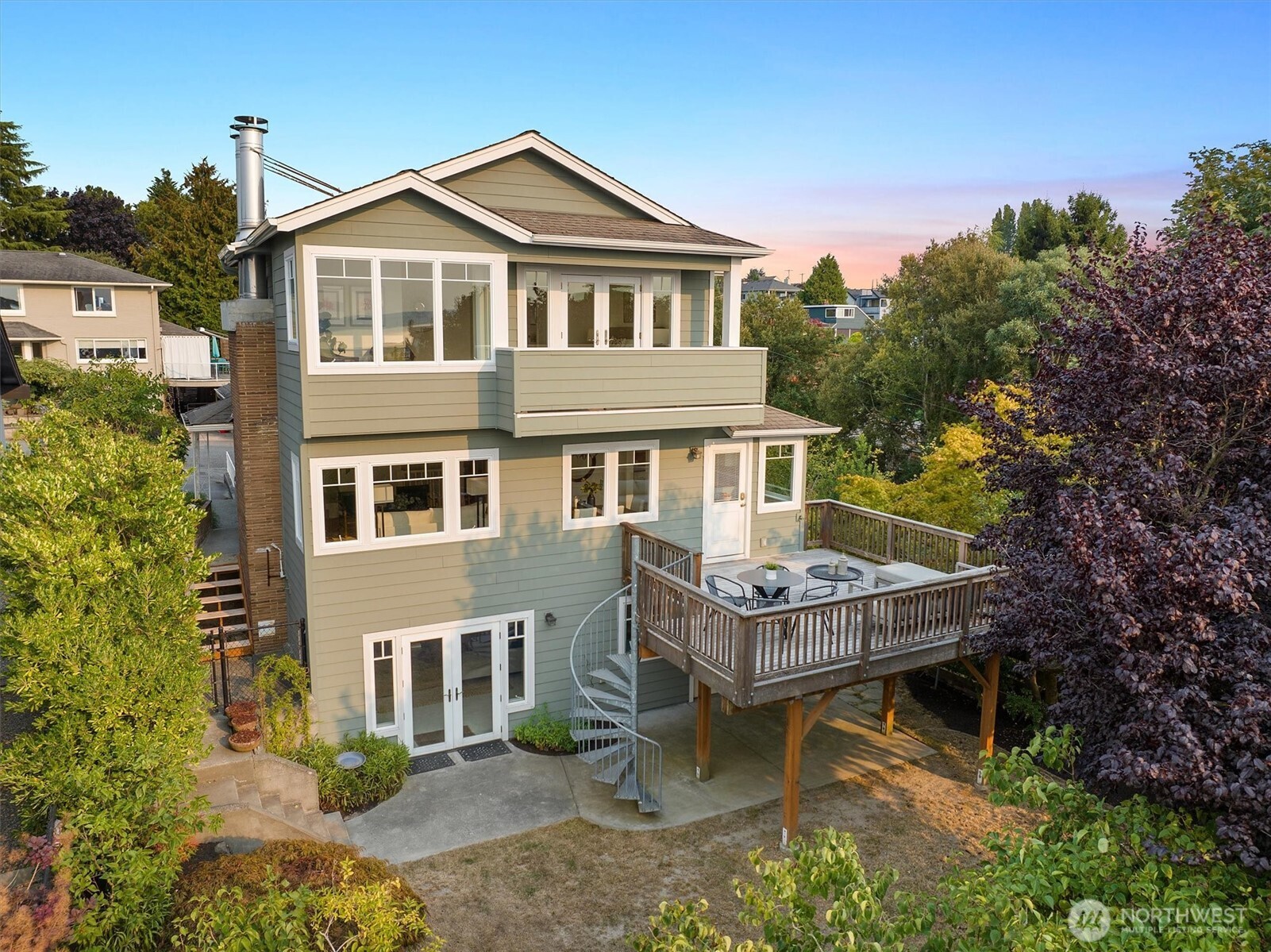 Perched above Shilshole Bay Marina, this expansive 4+ bedroom home offers stunning views, flexible living, and multiple outdoor spaces designed for year-round enjoyment.