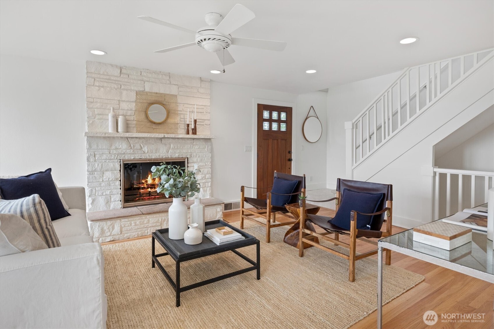 View of the living room from the dining room. Door is on the north side of the house.