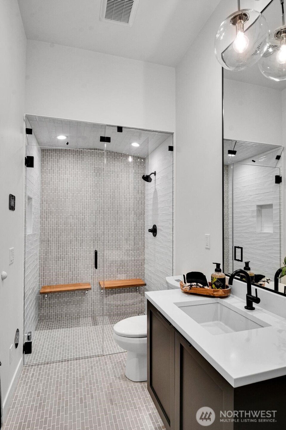3/4 bathroom with steam shower in lower level