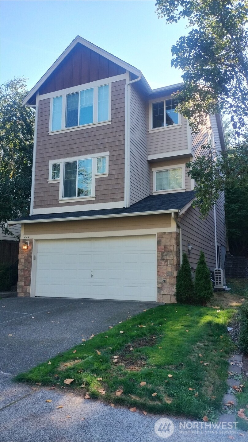 The home has a two car garage that leads onto the ground level with hallway to full bathroom, storage closet and 4th bedroom with is a rec room sized room with two windows and quadruple wide closets! Covered front porch with stylish aggregate steps and durable, metal handrail. Notice the storm door, which does lock.