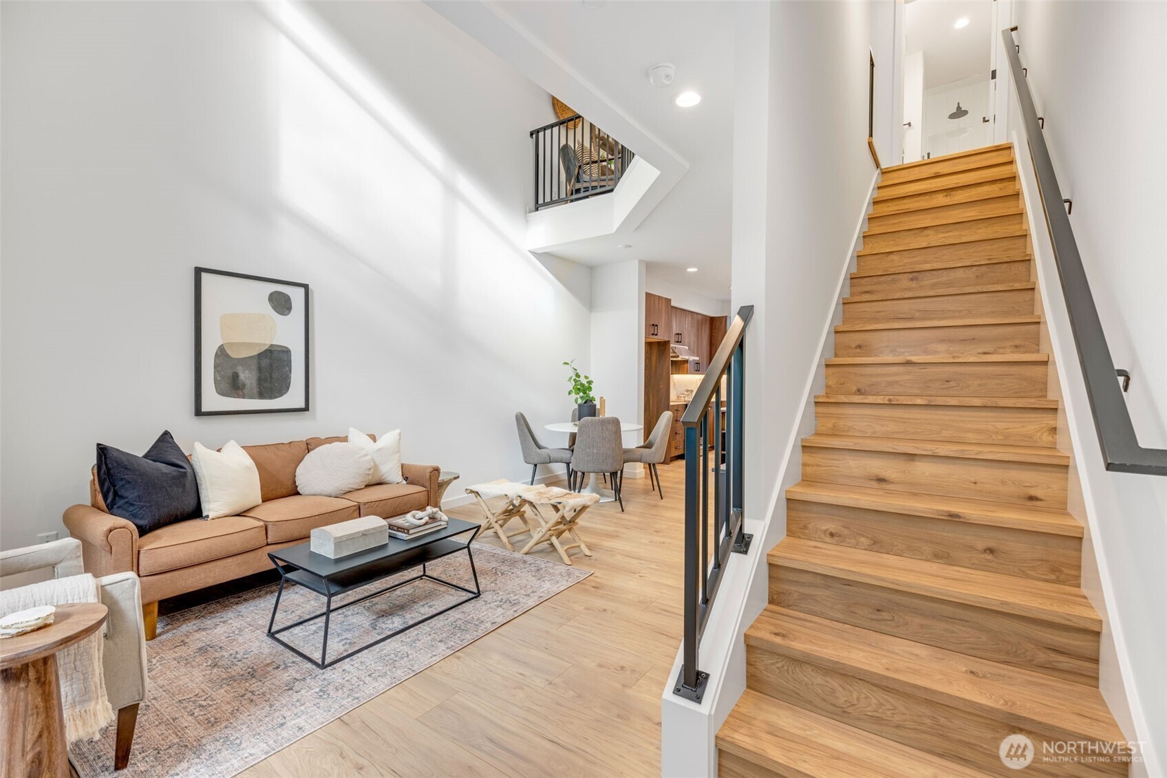 Looking in to the fabulous kitchen.  Note the amount of countertop/cabinet space!  Photo is of model home of same floorplan. Color schemes of finishes may vary.