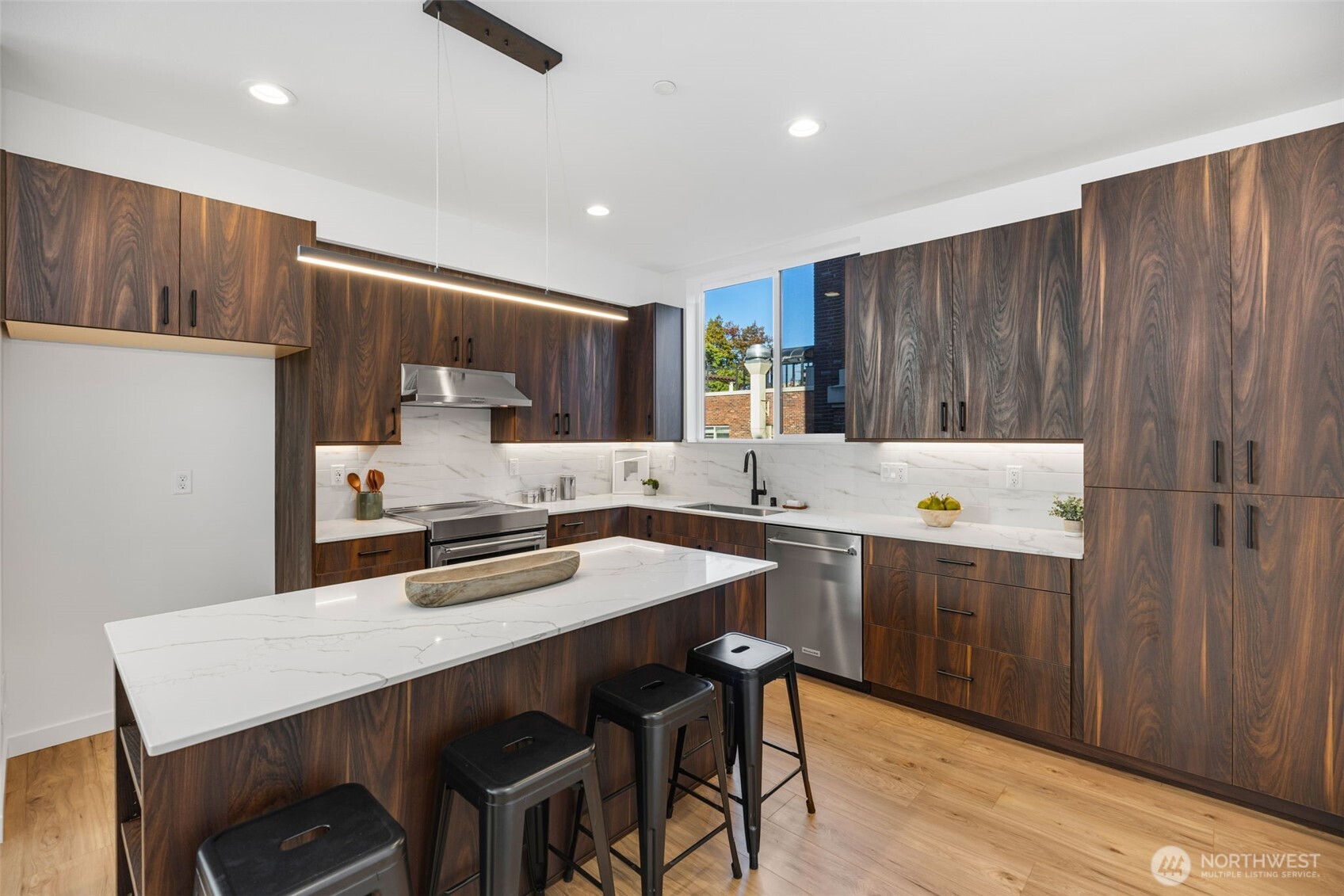 Third level, has room for a reading nook, office perhaps (Your vision here!) Photo is of model home of same floorplan. Color schemes of finishes may vary.